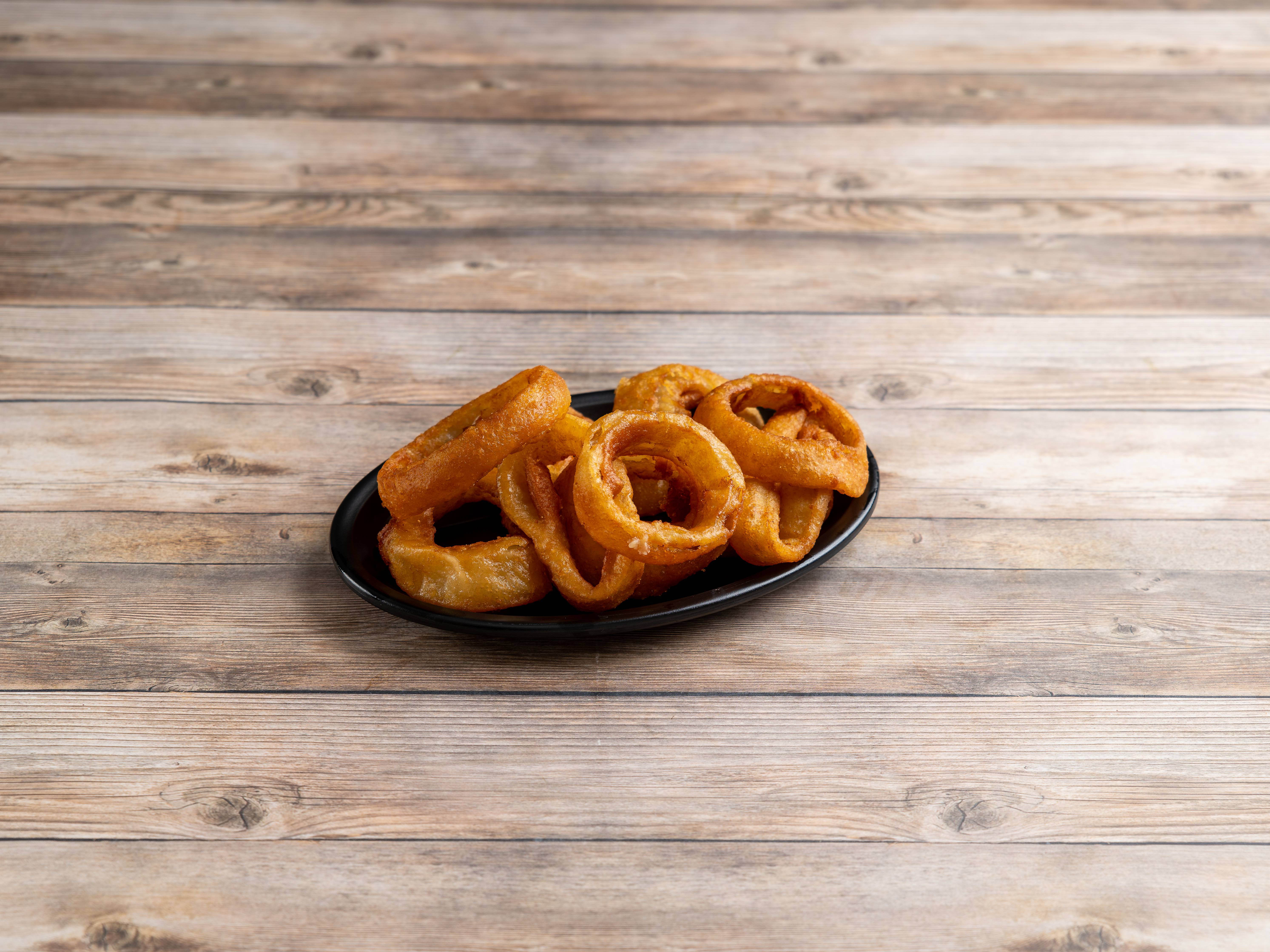Order Onion Rings food online from Rick Cheesesteak Shop store, Newport News on bringmethat.com