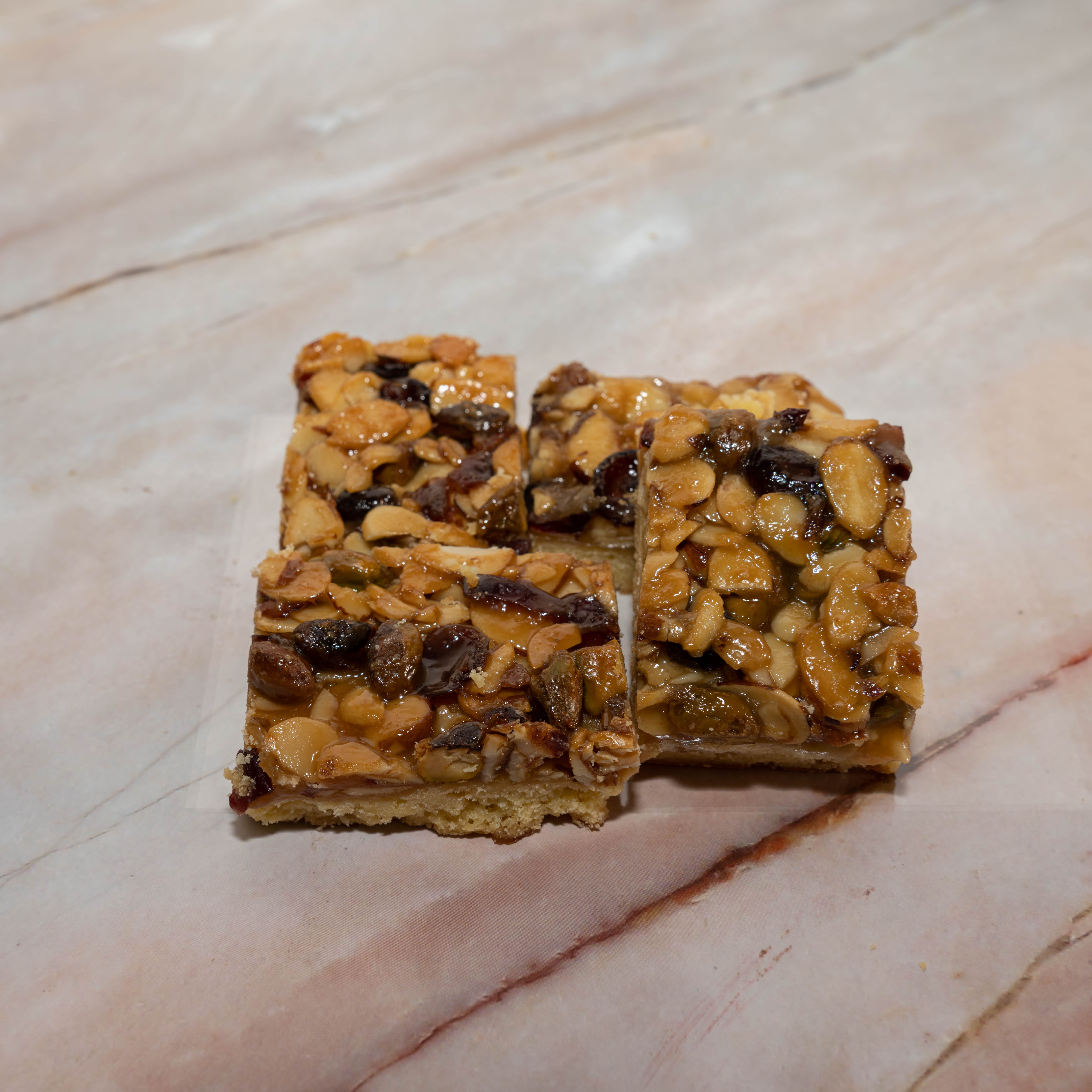 Order CRANBERRY ALMOND BARS food online from Teapot Bakery And Cafe store, Glendale on bringmethat.com