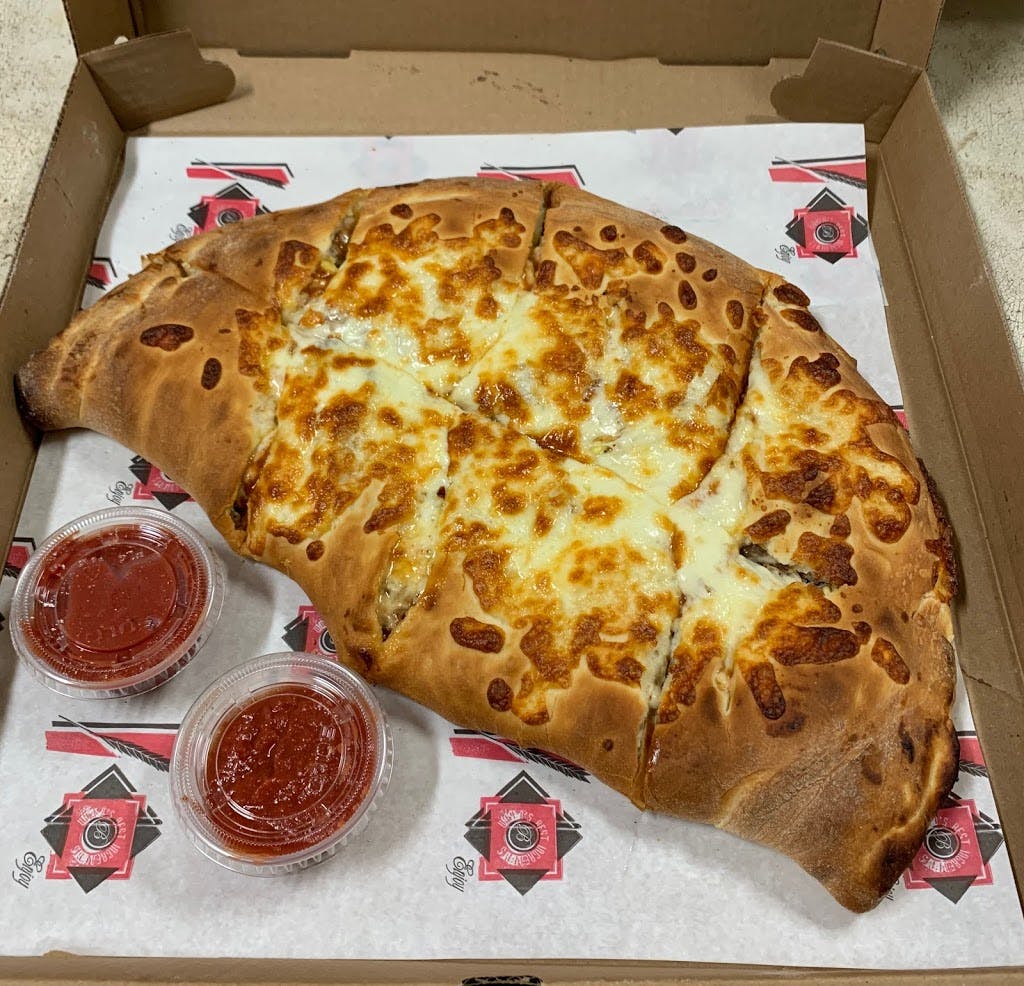 Order Steak & Cheese Calzone - Small food online from Pizza 24 store, Dorchester on bringmethat.com