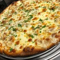 Order Margarita White Pizza - Large food online from Noli's Restaurant store, Winsted on bringmethat.com