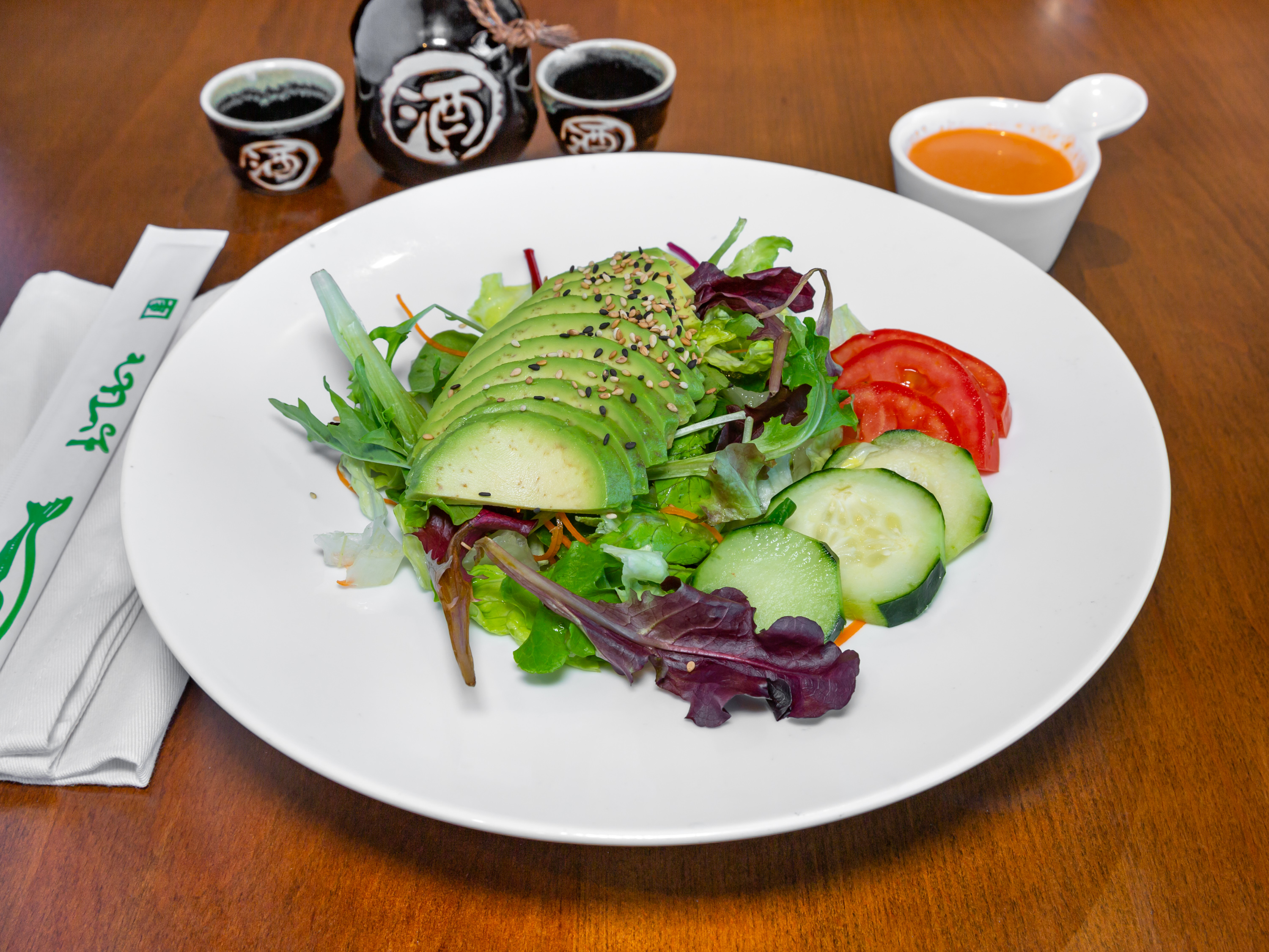 Order Avocado Salad (Served with ginger dressing) food online from D M Sushi store, Easton on bringmethat.com