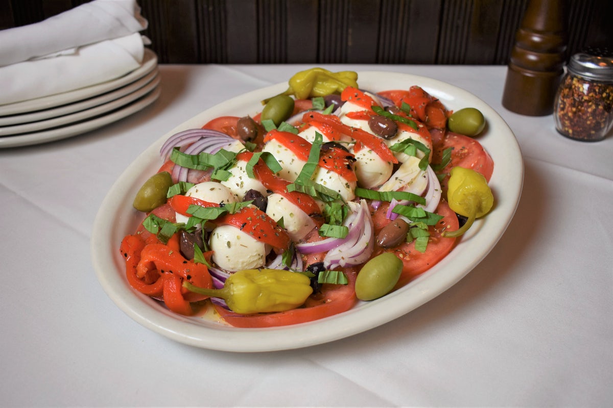 Order Caprese Salad food online from Carmine's store, Atlantic City on bringmethat.com