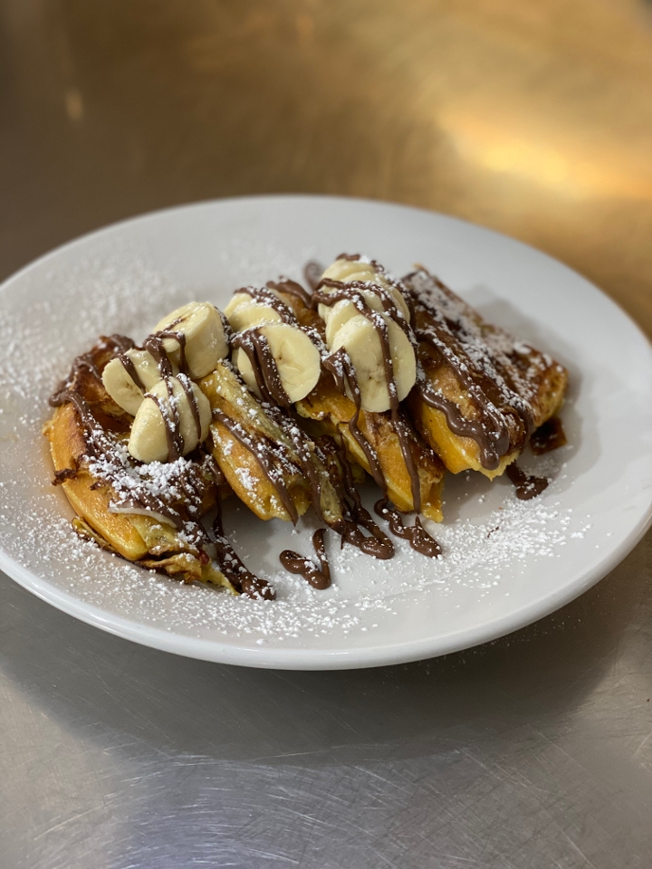 Order BANANA NUTELLA WAFFLE FRENCH TOAST food online from The Point Pancake House store, Gurnee on bringmethat.com