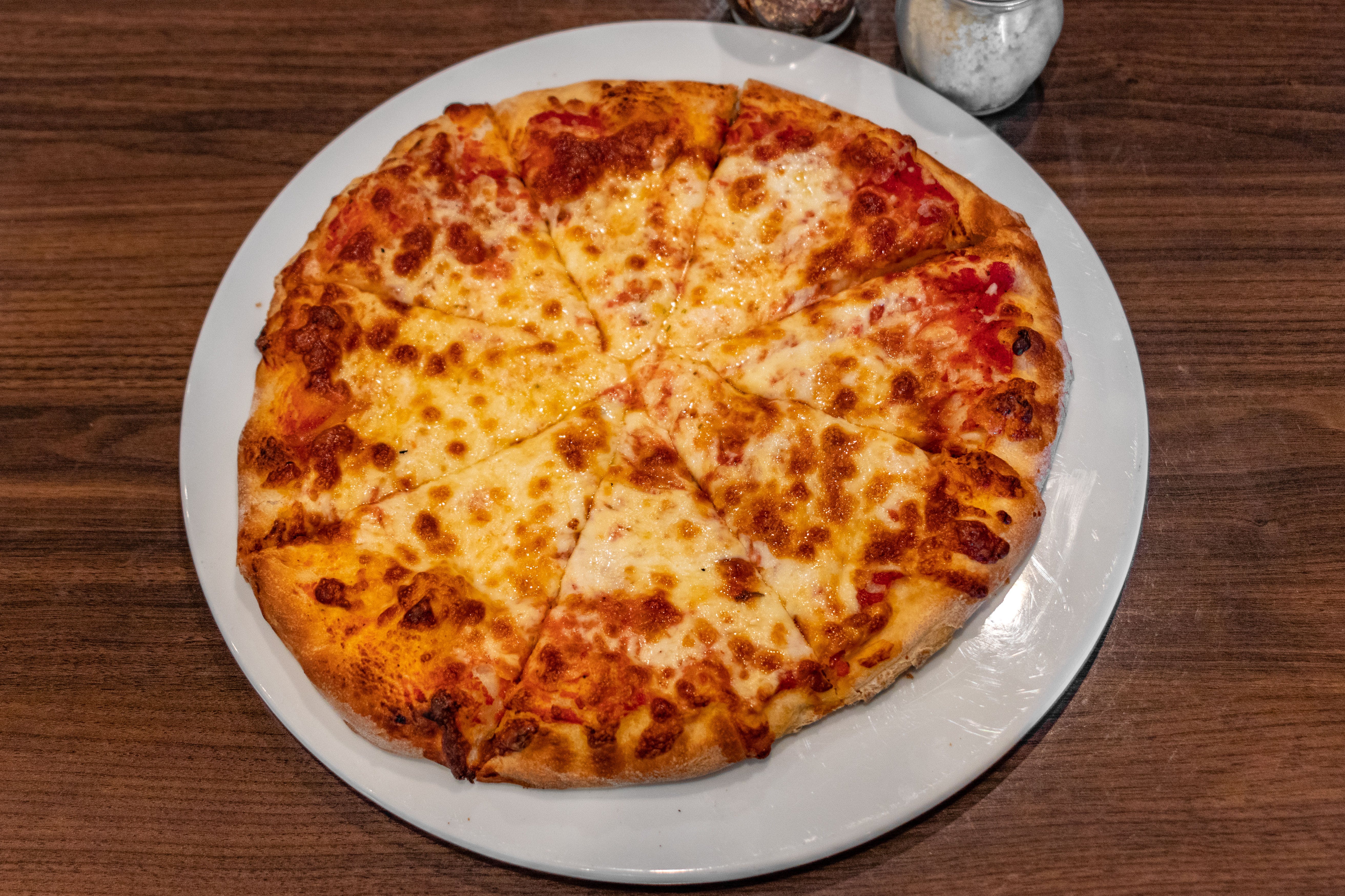Order Cheese Pizza - Small food online from Darcos Restaurant store, Bethel on bringmethat.com