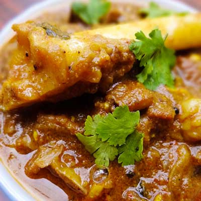 Order House Special Goat Curry food online from Biryani Pot store, Newark on bringmethat.com
