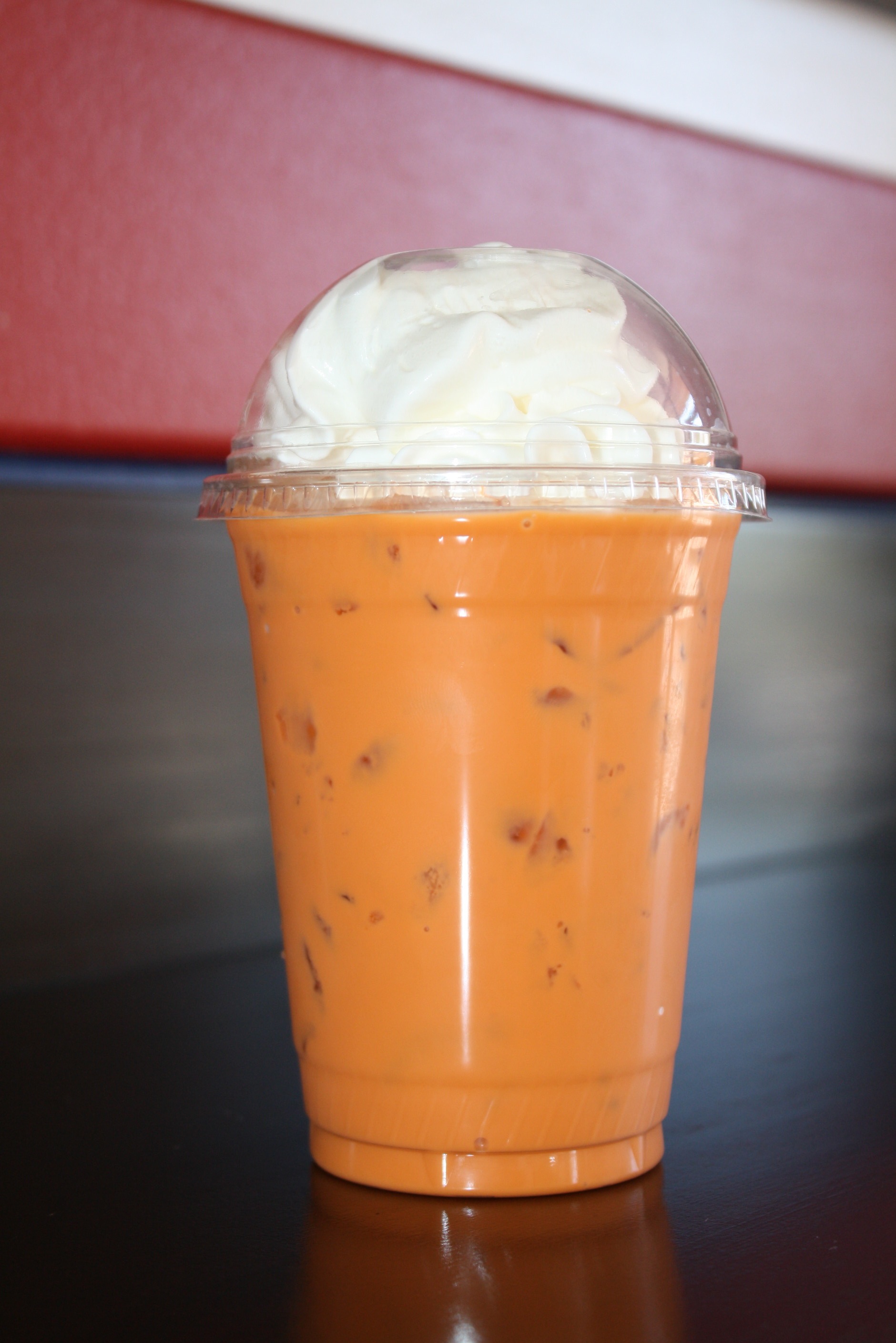 Order Thai Iced Tea food online from College Sub Shop store, San Diego on bringmethat.com