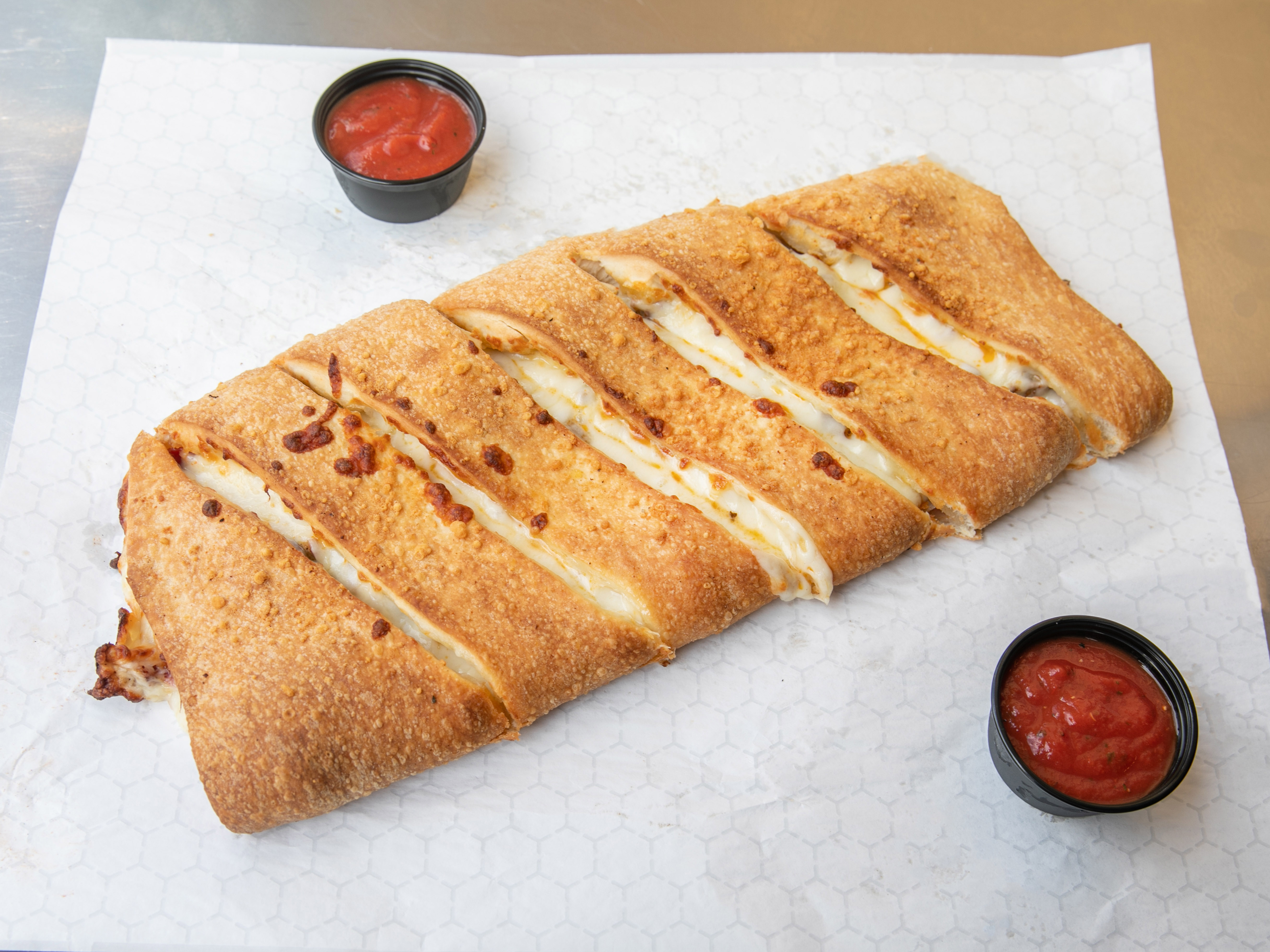 Order Build Your Own Cheese Stromboli food online from Tito's Pizza store, Columbus on bringmethat.com