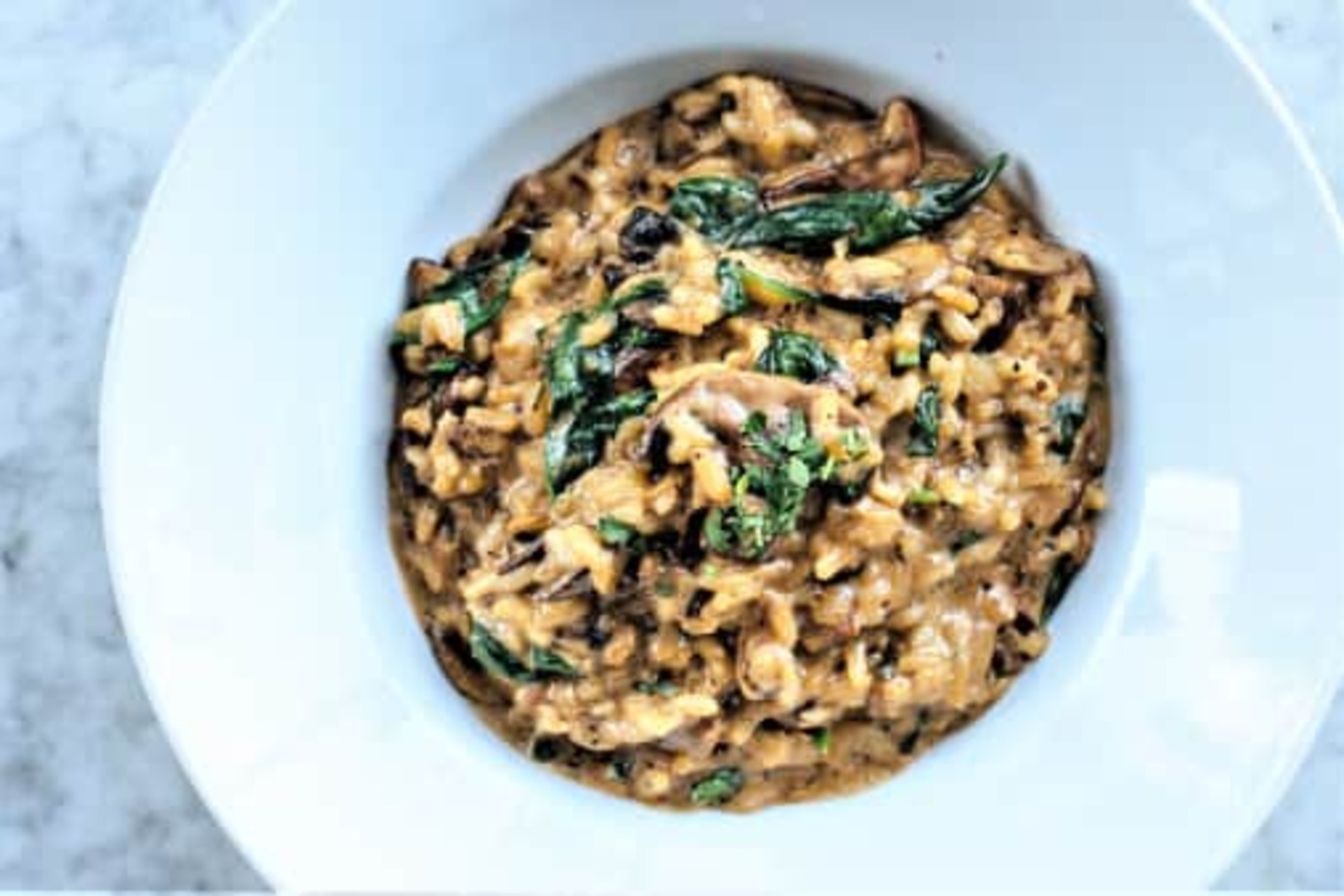 Order Porcini Risotto food online from Berri Cafe store, Los Angeles on bringmethat.com
