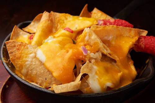 Order Nachos and Cheese food online from Mocha Bleu store, Teaneck on bringmethat.com