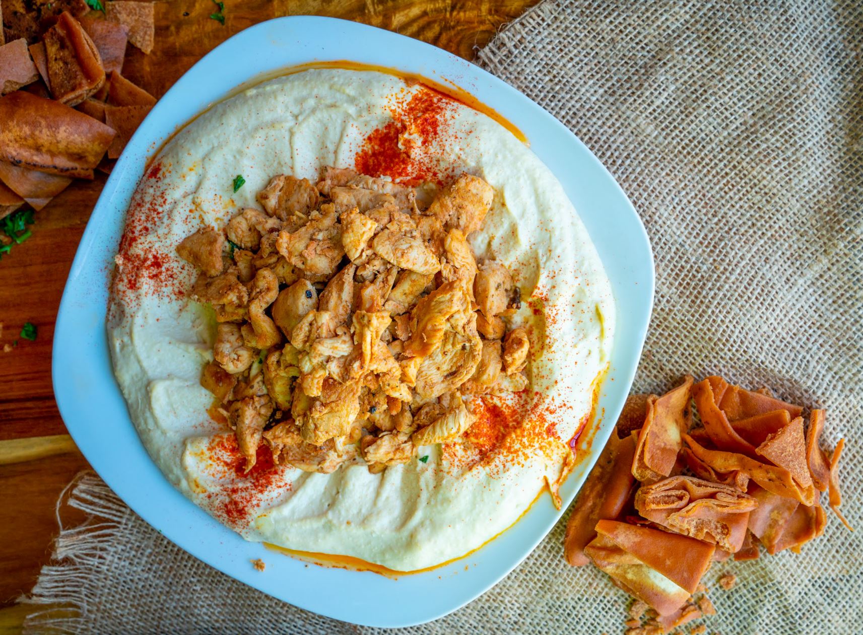 Order Hummus with Chicken Shawarma  food online from The Butcher Grille store, Dearborn on bringmethat.com