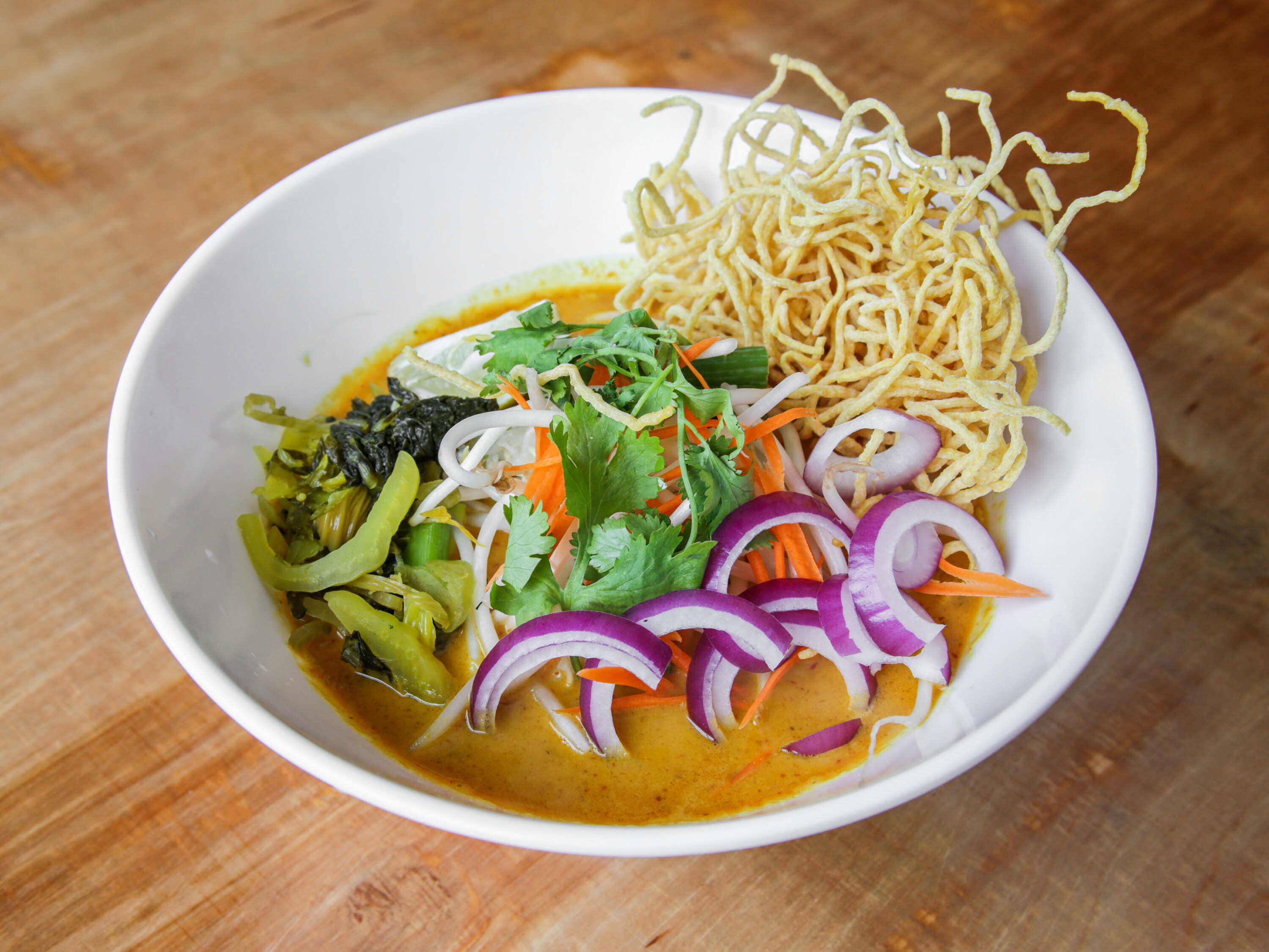 Order Khao Soi food online from Thai Sky Kitchen store, Portland on bringmethat.com