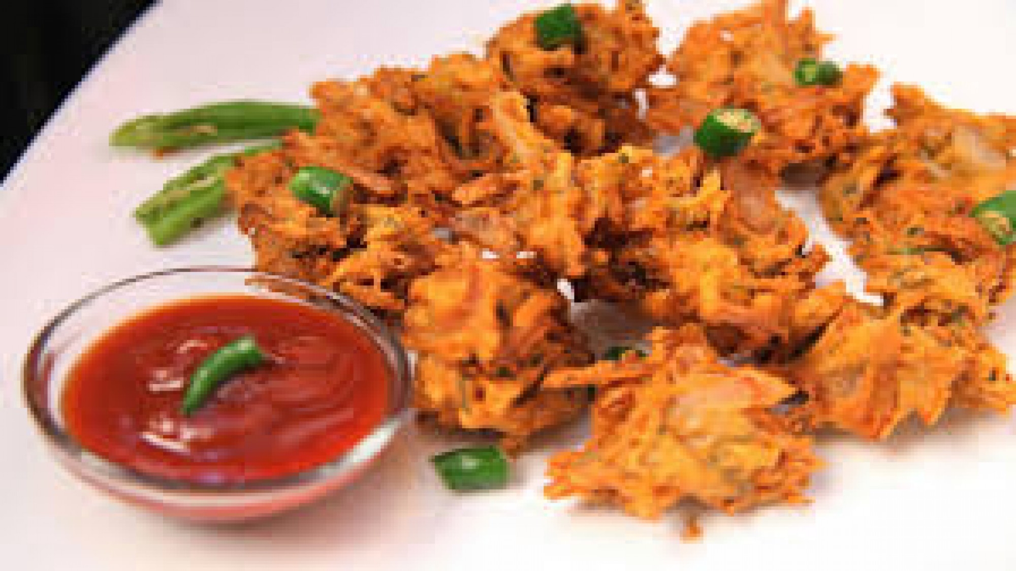 Order VEGETABLE PAKORA food online from Swapna Indian Cuisine store, Atlanta on bringmethat.com