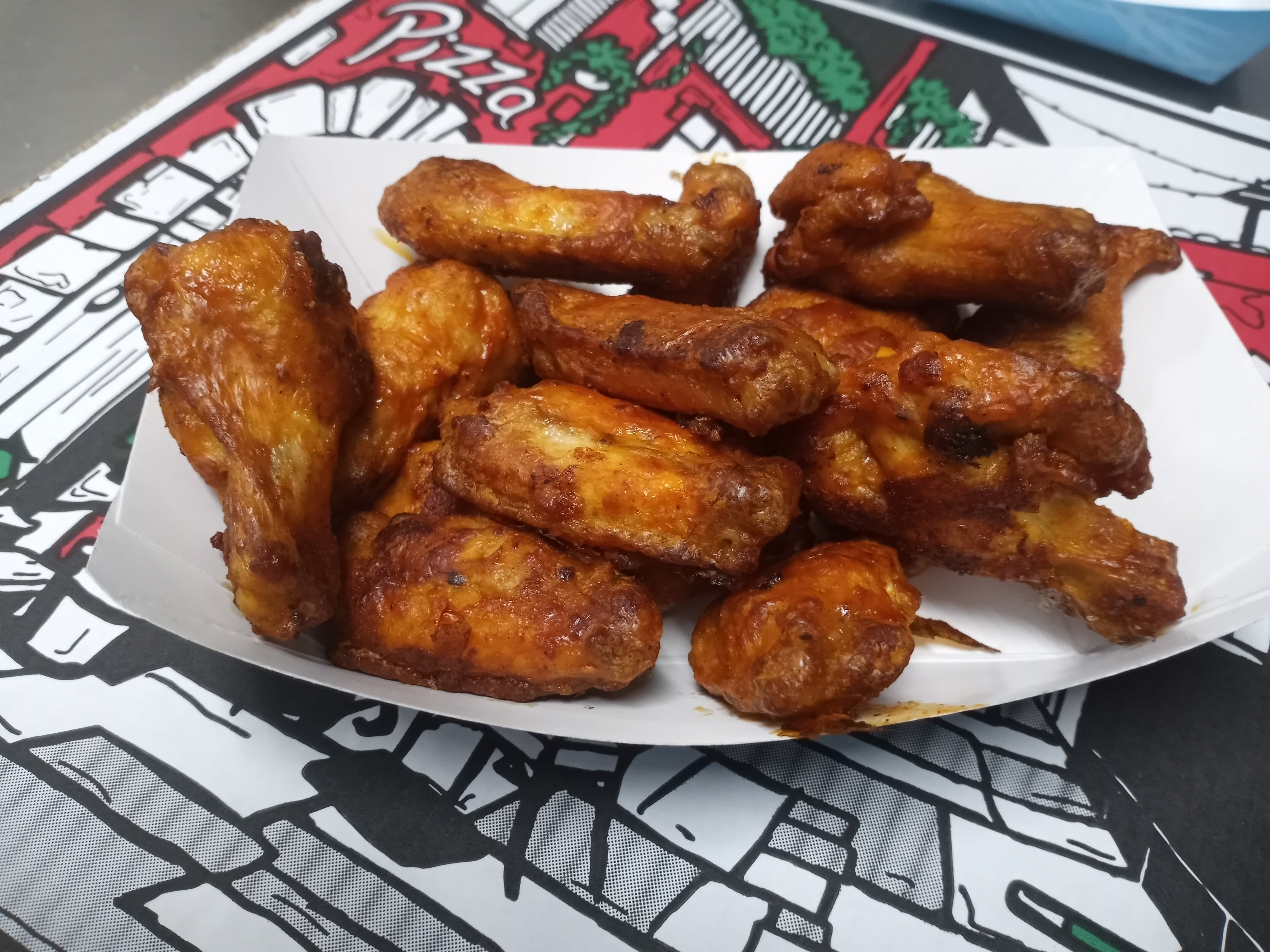 Order Buffalo Wings - 6 Pieces Buffalo food online from Baggi Pizza store, Delano on bringmethat.com