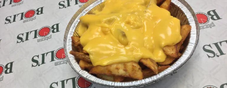Order French Fries with Cheese - Regular food online from Pizza Boli's And Fried Chicken store, Mechanicsburg on bringmethat.com