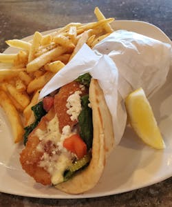 Order * Fish Sandwich food online from Zorbas Fine Greek Cuisine store, Albuquerque on bringmethat.com