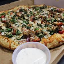 Order Greek Pizza food online from Aladdin Sizzler store, Mount Rainier on bringmethat.com