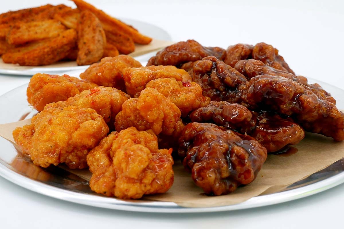 Order Buddy Pack (feeds 2-3) with Boneless or Original Wings  food online from Wing Zone store, Dayton on bringmethat.com