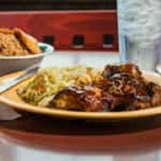 Order BBQ Chicken food online from Caribbean Hut store, Charlotte on bringmethat.com