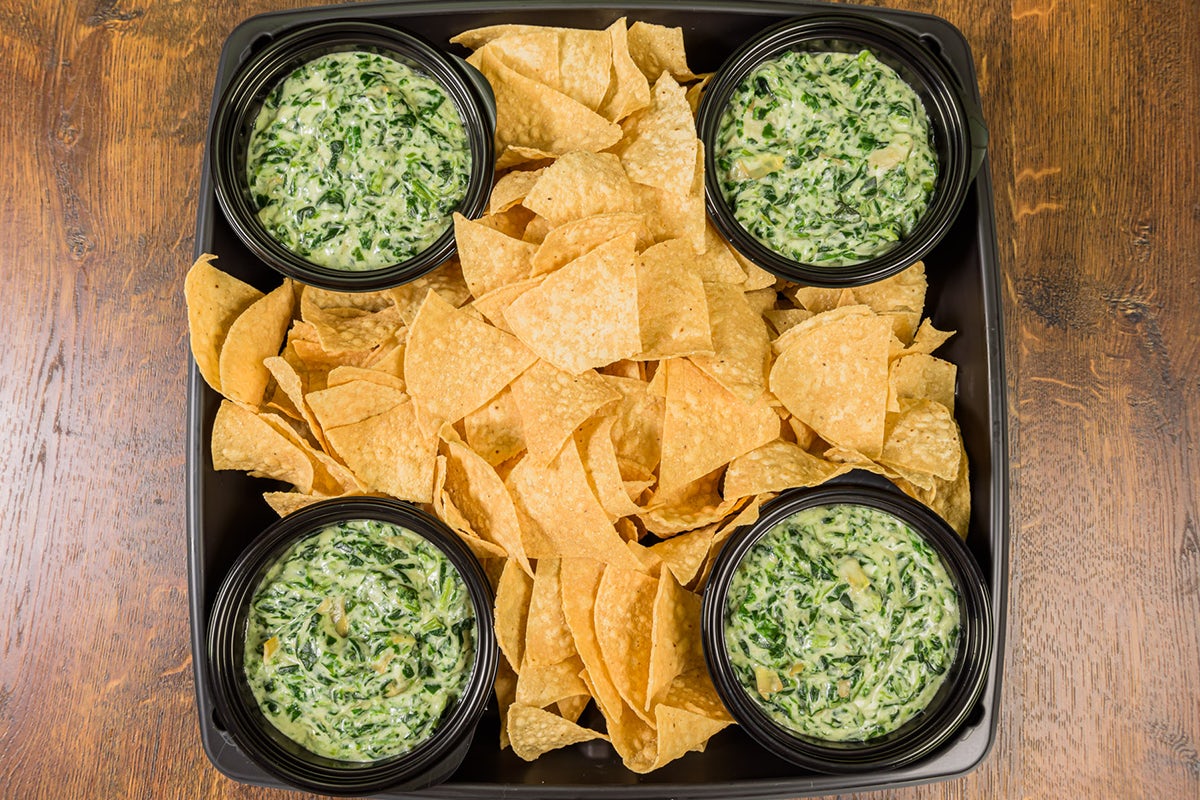 Order PARTY PLATTER CREAMY SPINACH & ARTICHOKE DIP food online from Miller'S Ale House store, Dawsonville on bringmethat.com