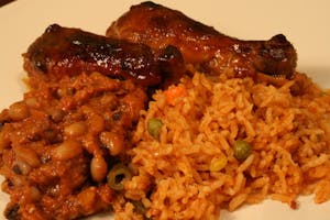 Order Jollof Rice food online from Loves Kitchen store, Roswell on bringmethat.com