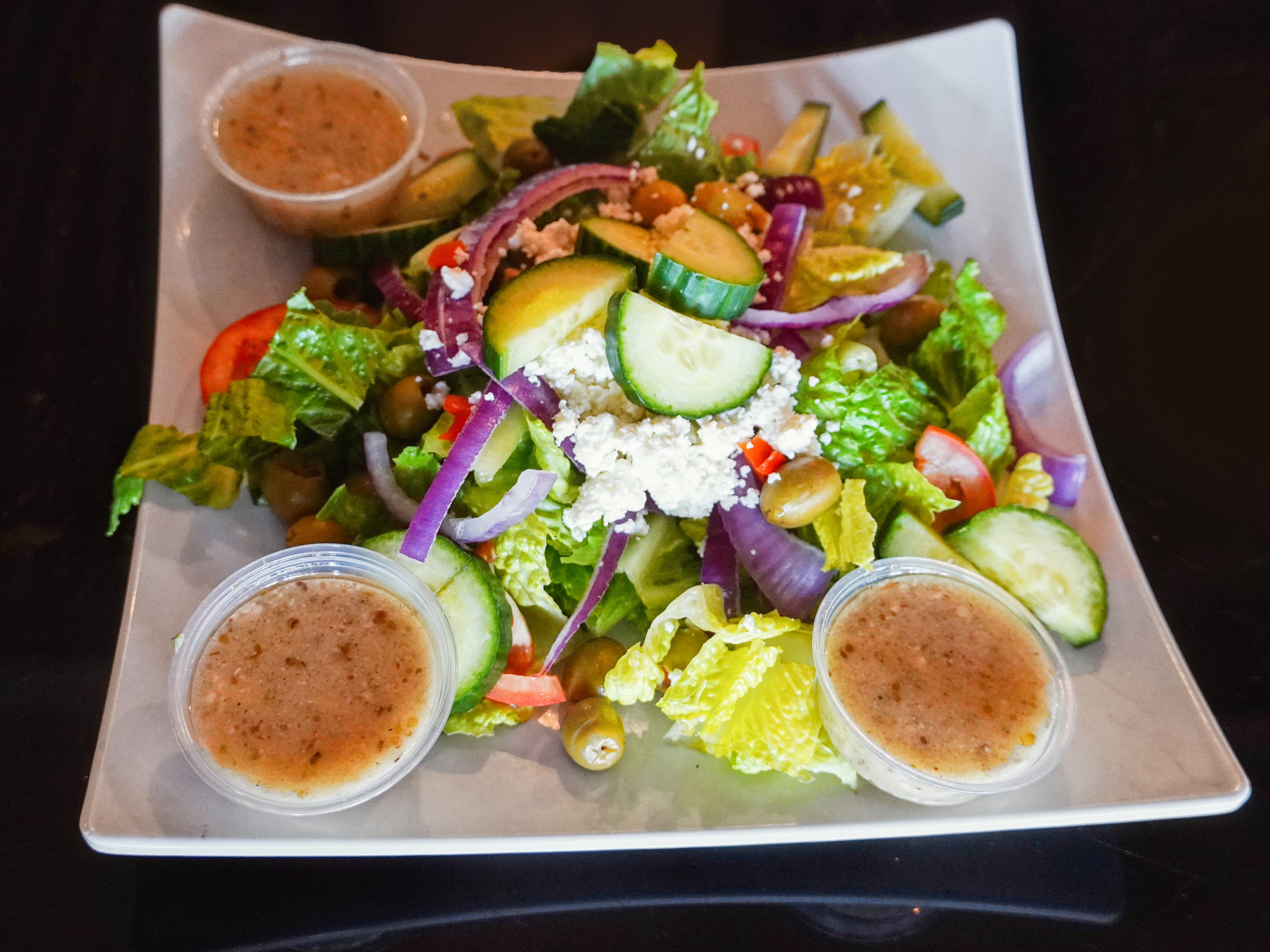 Order Greek Salad food online from Haifa Restaurant store, New Orleans on bringmethat.com