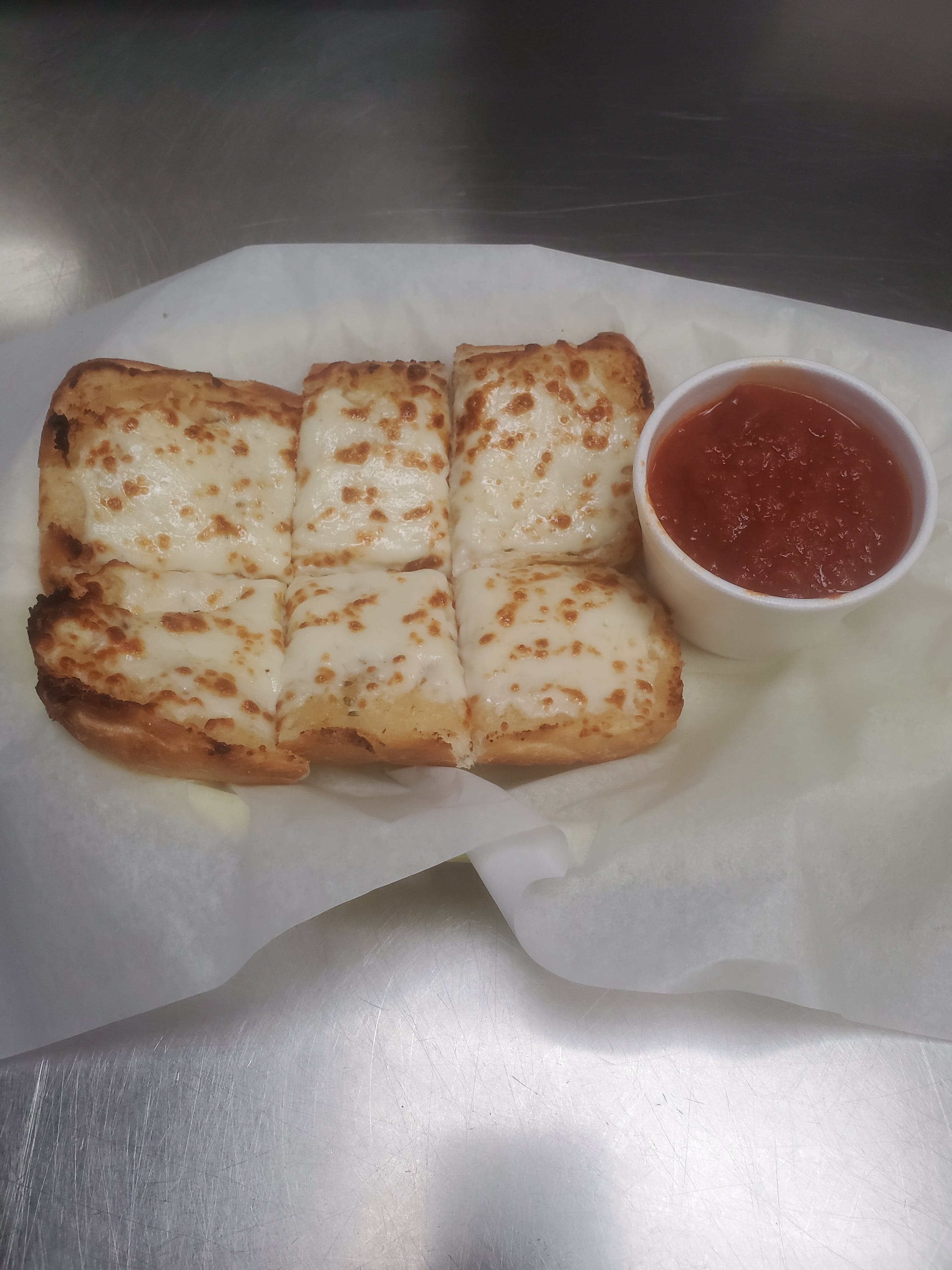 Order Garlic Bread with Cheese - Appetizer food online from Pizza Cucina store, Oswego on bringmethat.com