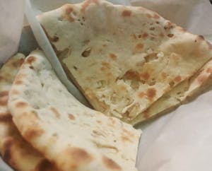 Order Onion Naan food online from Masala 2 Indian Restaurant store, Hollywood on bringmethat.com