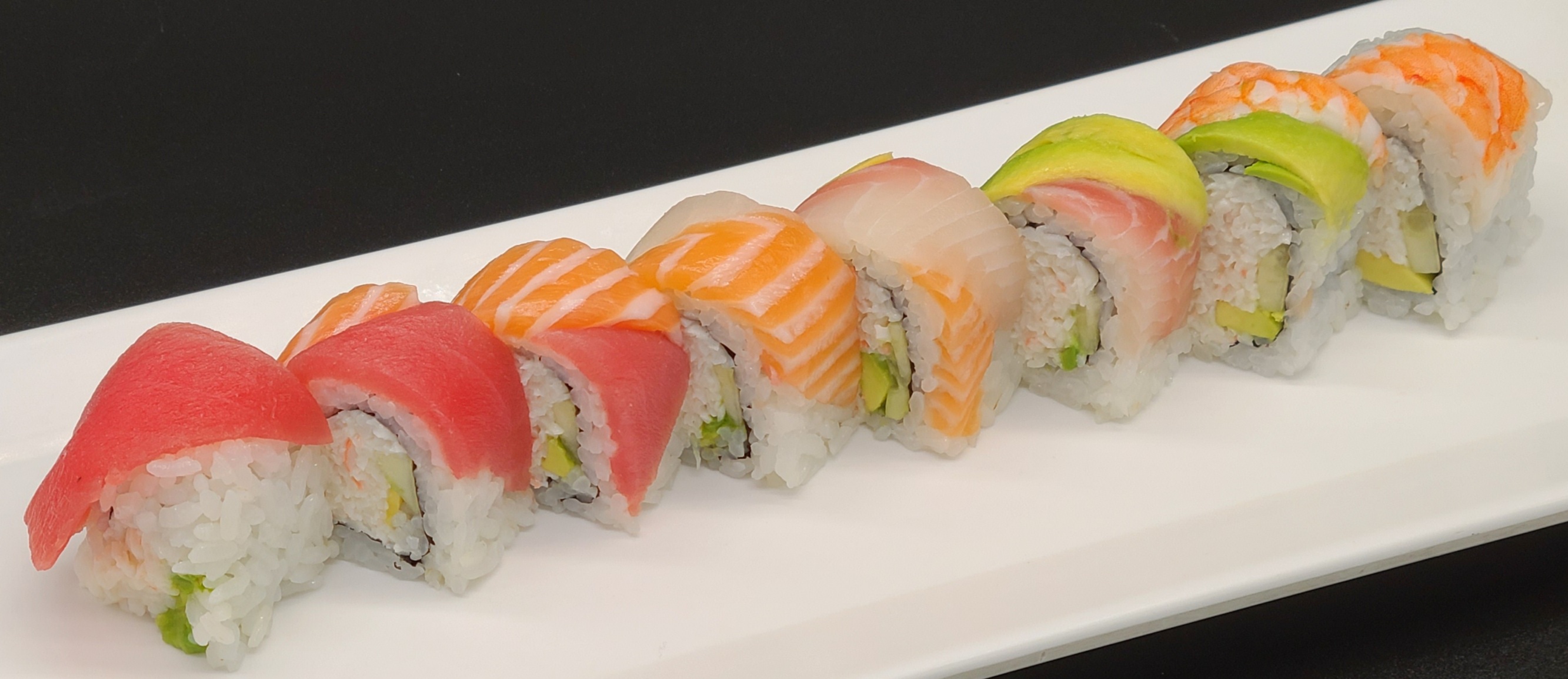 Order F23. Rainbow Roll(8pcs) food online from Hello Sushi store, Fullerton on bringmethat.com