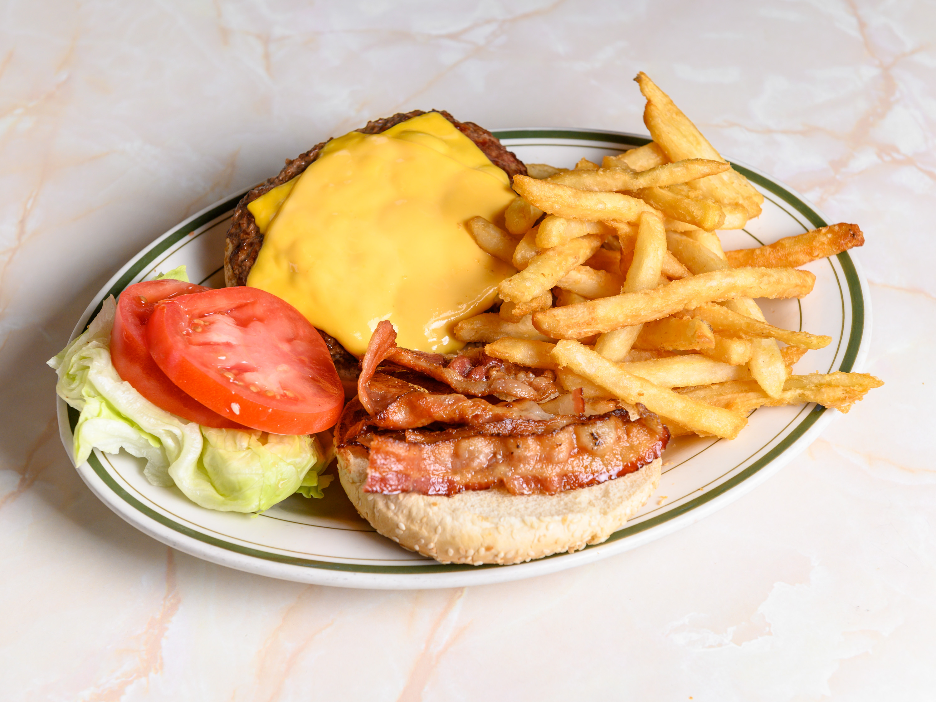 Order American Style Burger Deluxe food online from Ritz Diner store, New York on bringmethat.com