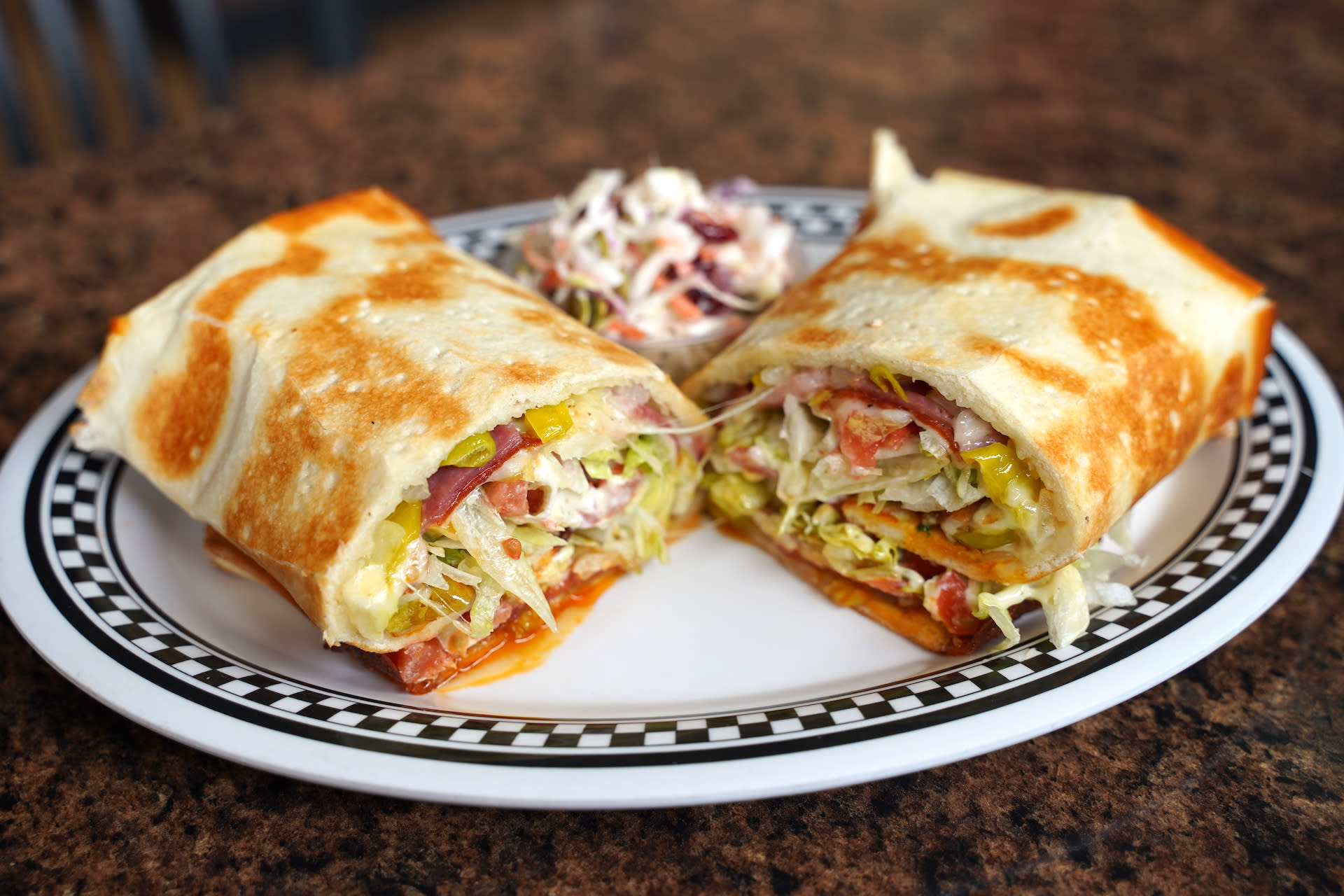 Order Grinder Panino food online from Panino's Downtown store, Colorado Springs on bringmethat.com