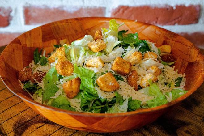 Order Caesar Salad food online from Gondola Pizza store, La Mirada on bringmethat.com