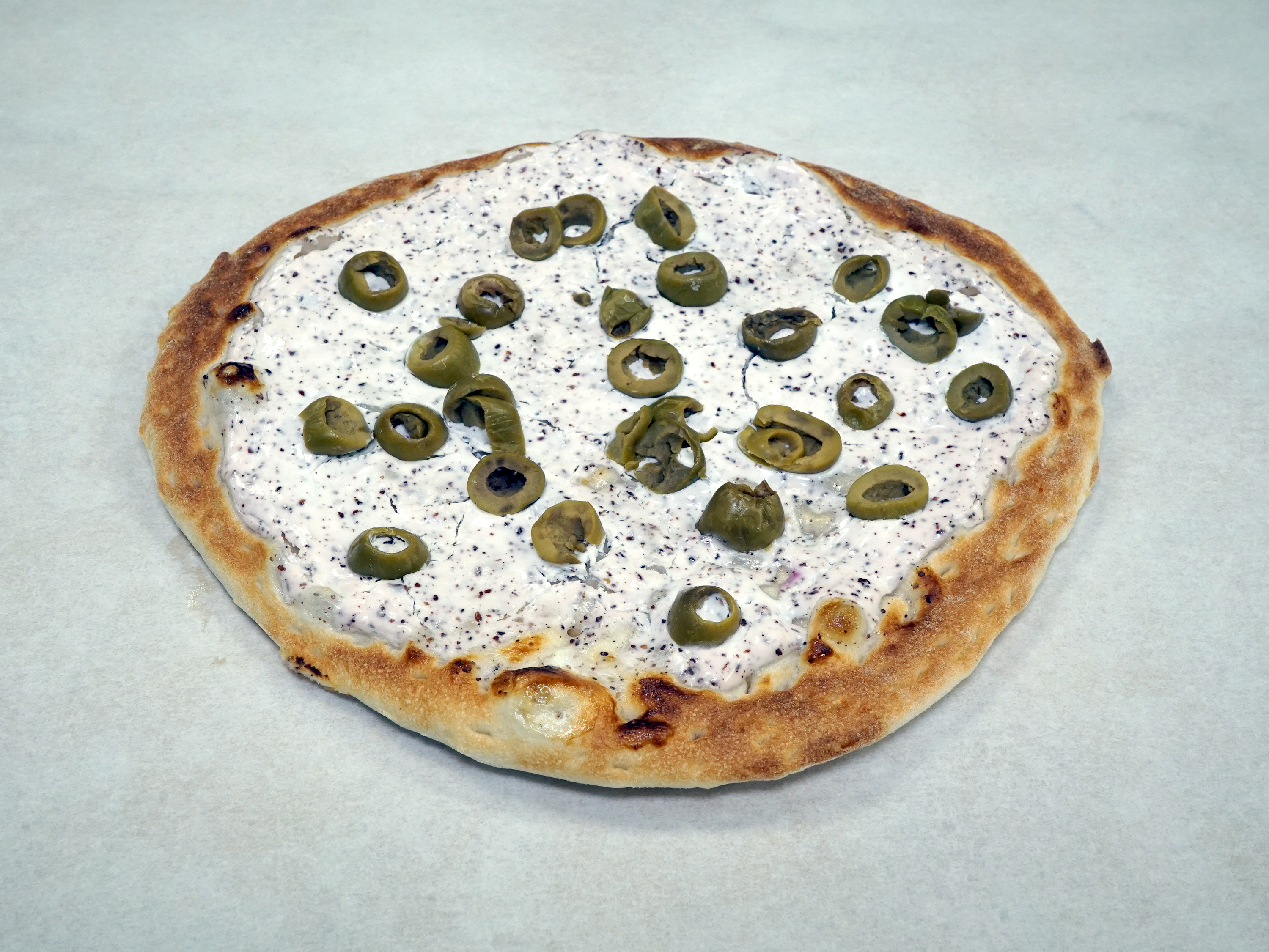 Order Labneh and Green Olives Pie food online from Olive Bakery store, Orland Park on bringmethat.com