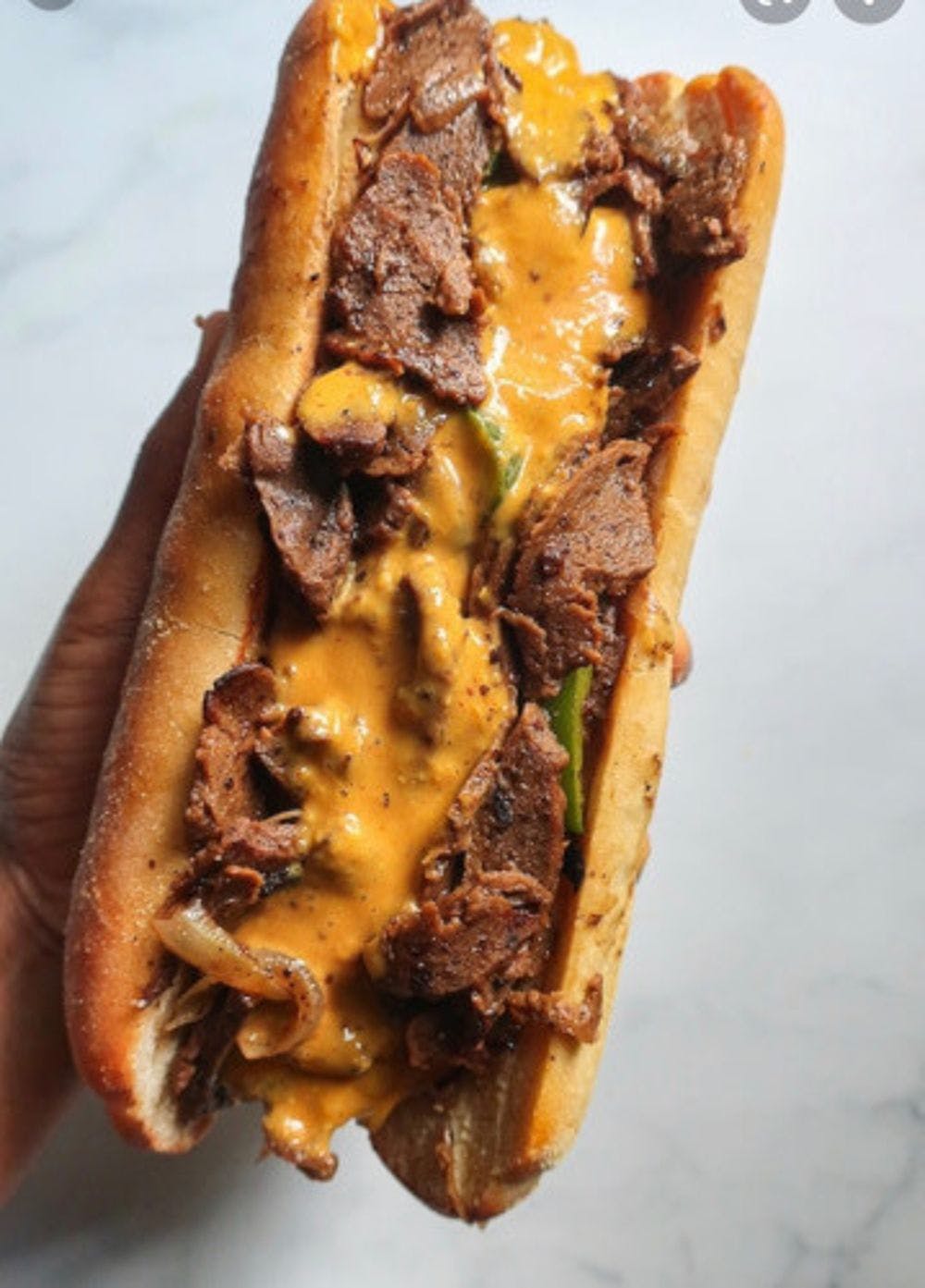 Order Philly Cheesesteak Sandwich - Sandwich food online from Mike Bagel Deli & Cafe store, Roselle on bringmethat.com