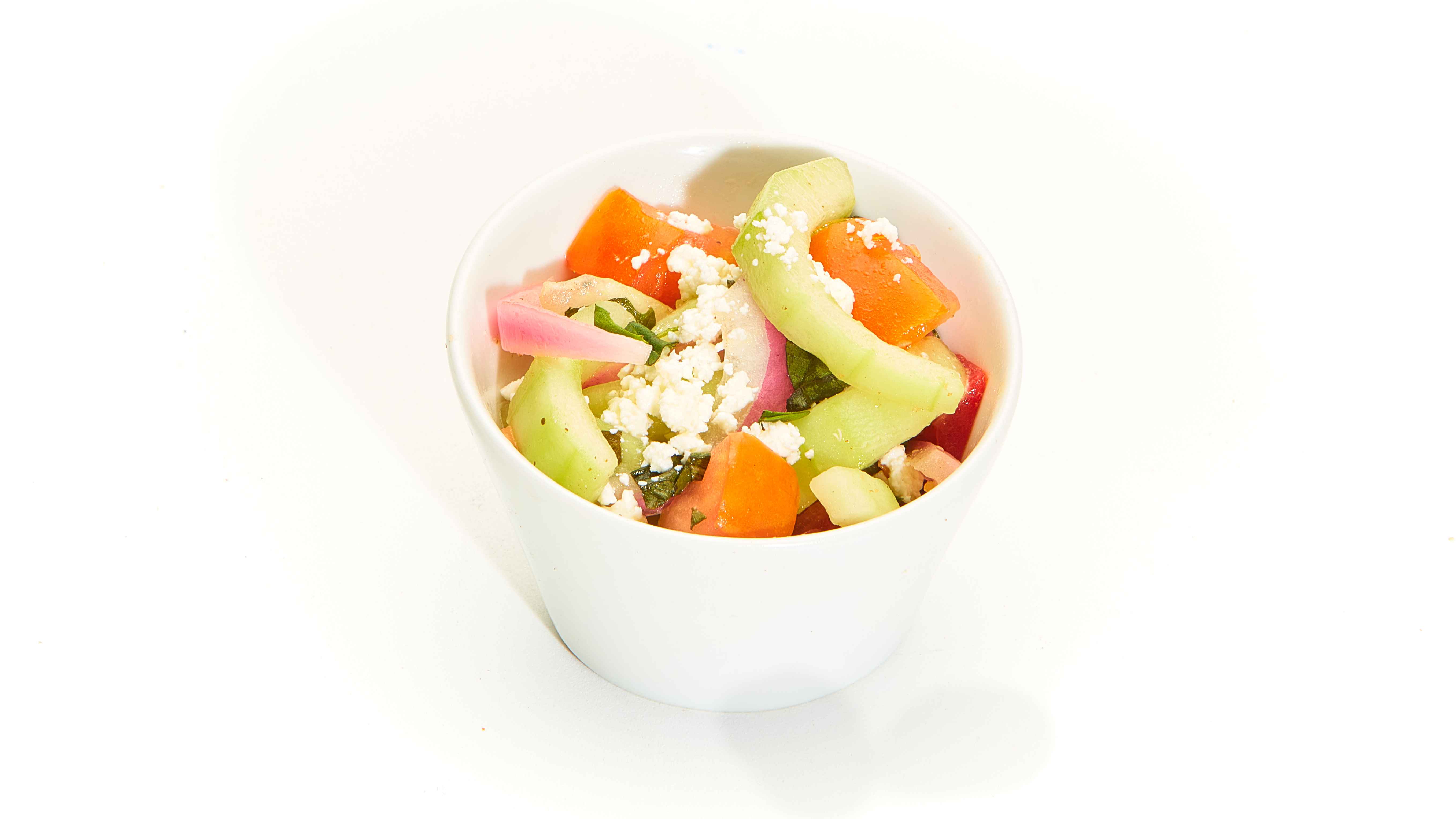 Order Side of Tomato-Cucumber Salad food online from Taziki Cafe store, Tuscaloosa on bringmethat.com