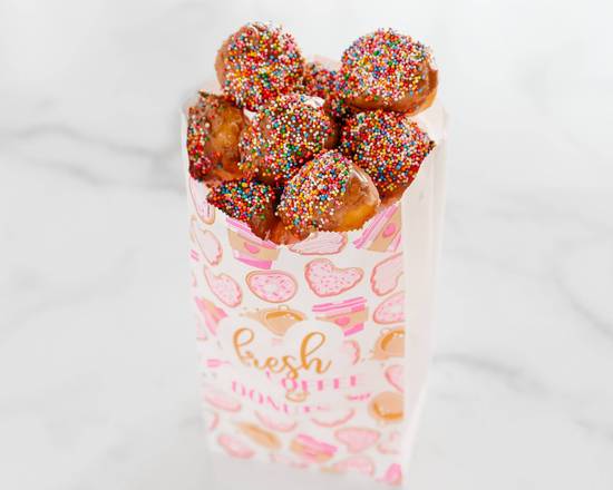 Order Chocolate Sprinkle Donut Holes by the Doz food online from Kim's Donuts store, Dallas on bringmethat.com