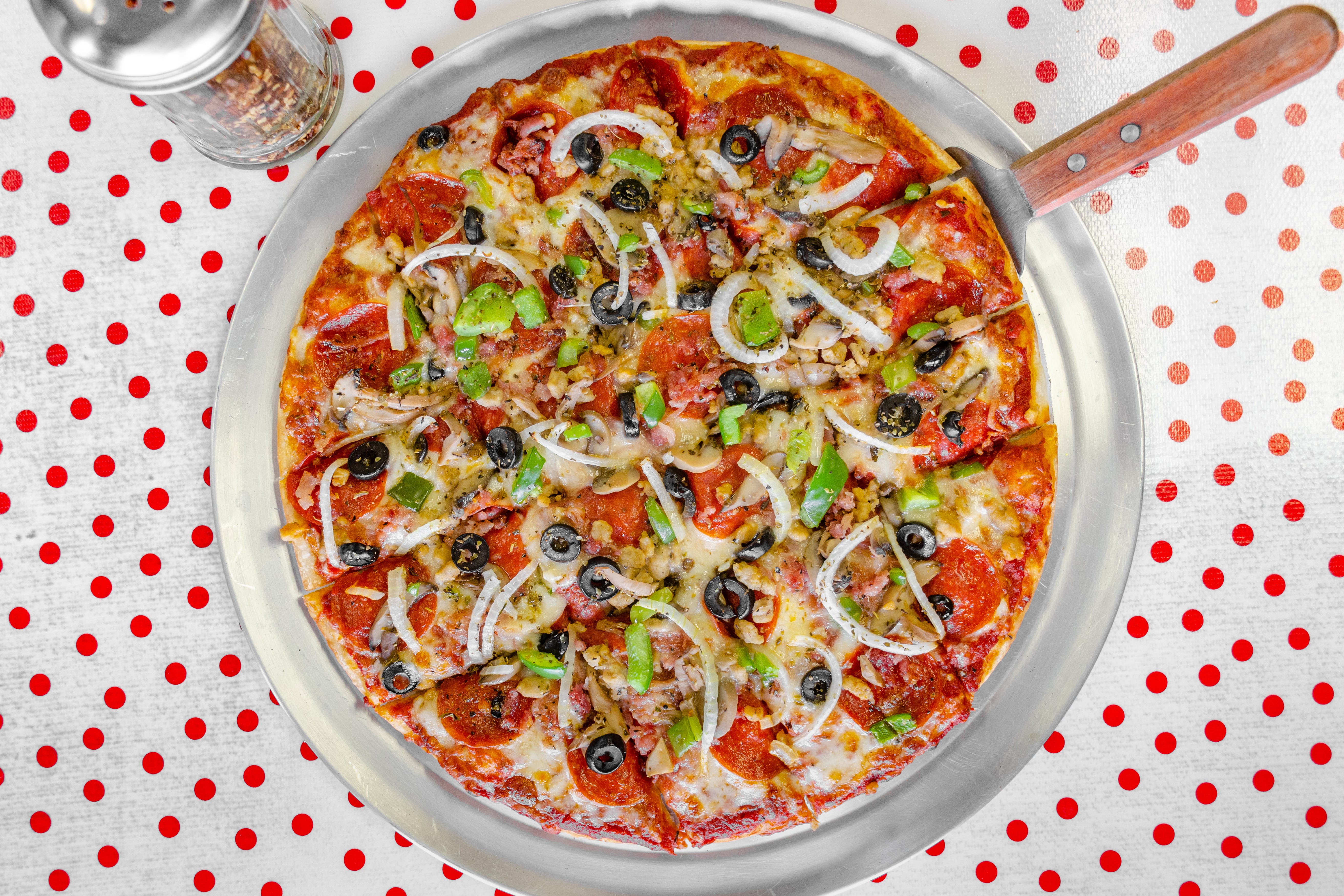 Order The Saucy Deluxe Pizza - Small 12" food online from Saucy Sisters Pizzeria store, Leesburg on bringmethat.com