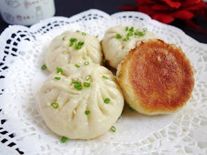 Order A28. 生煎包 Pan Fried Buns with Pork food online from Shanghai Fresh store, Cambridge on bringmethat.com