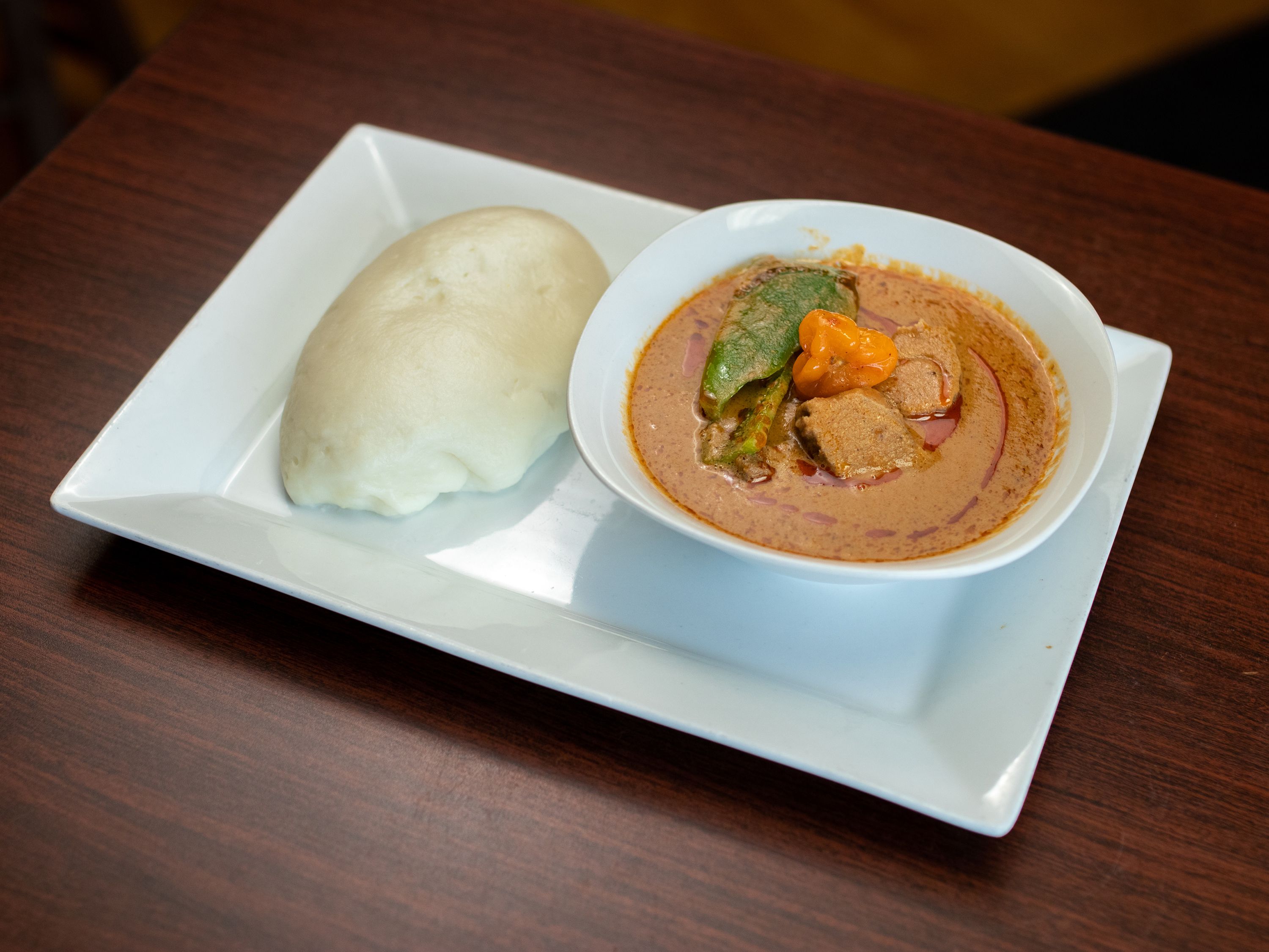 Order Fufu and Peanut Stew food online from Chaima Cuisine store, Omaha on bringmethat.com
