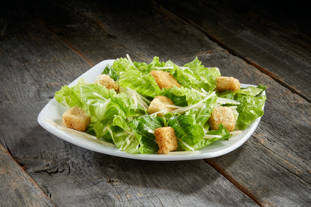Order Caesar Side Salad food online from Sizzler store, Culver City on bringmethat.com