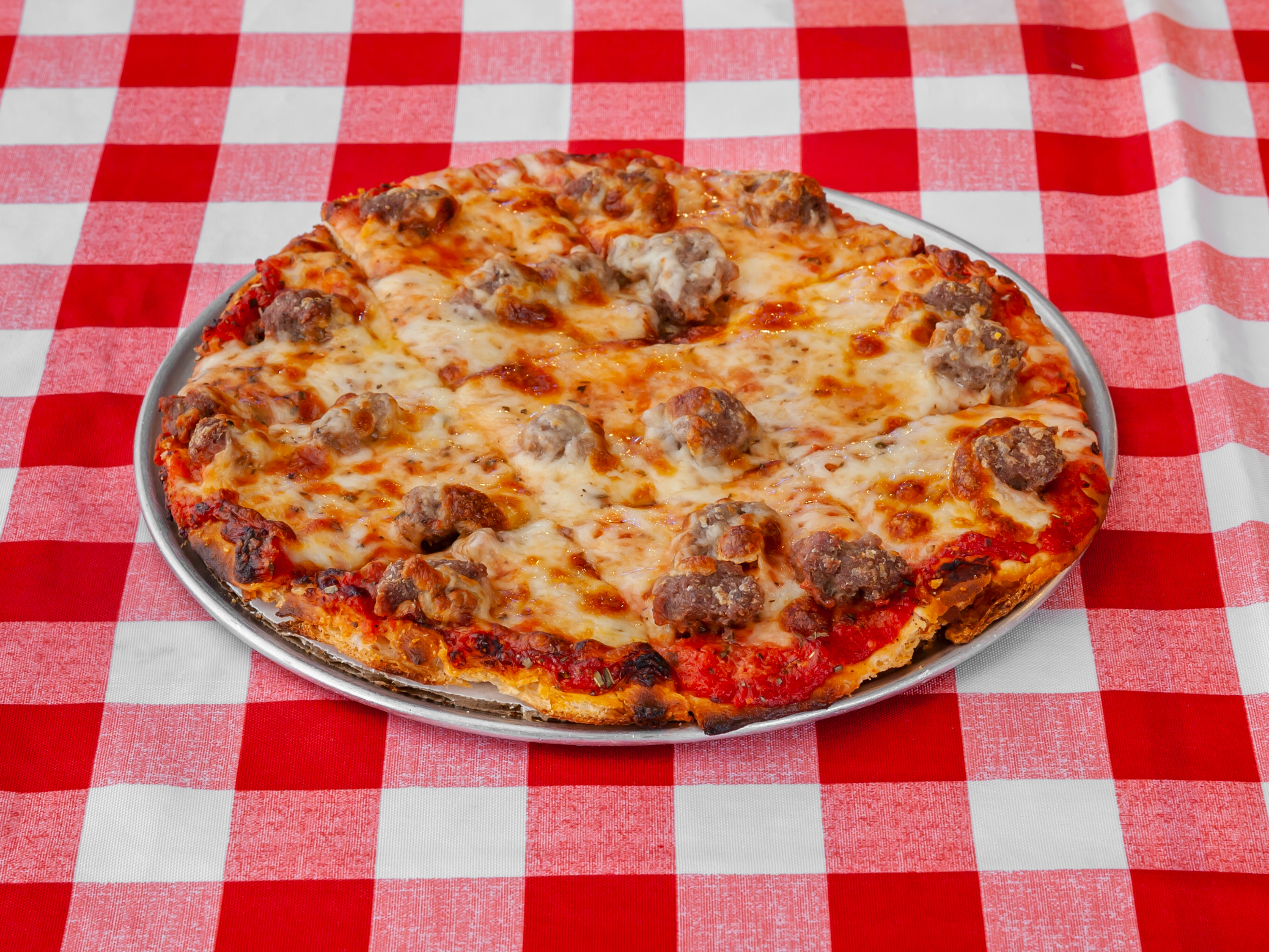 Order 8" Cheese and Sausage Pizza food online from Quonset Pizza store, Waukegan on bringmethat.com