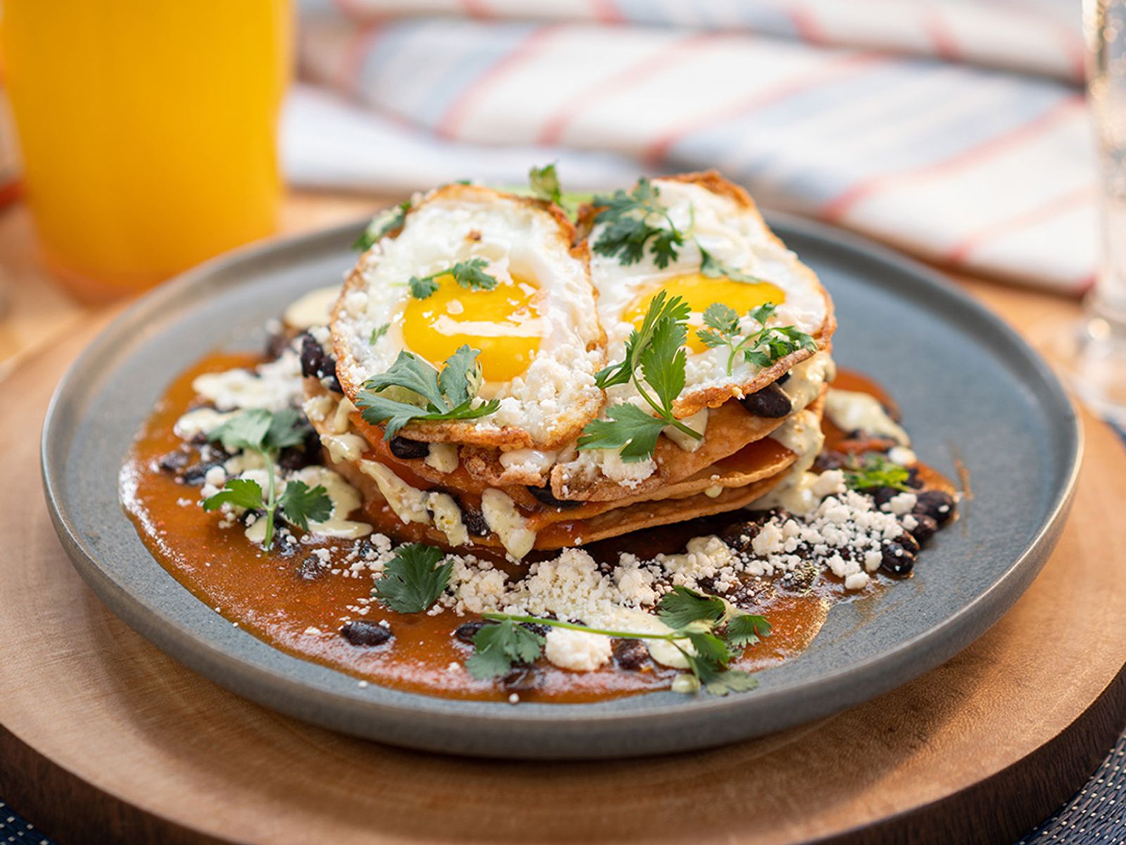 Order Chilaquiles Breakfast Nachos food online from Seaside Burritos And Tacos store, Long Beach on bringmethat.com