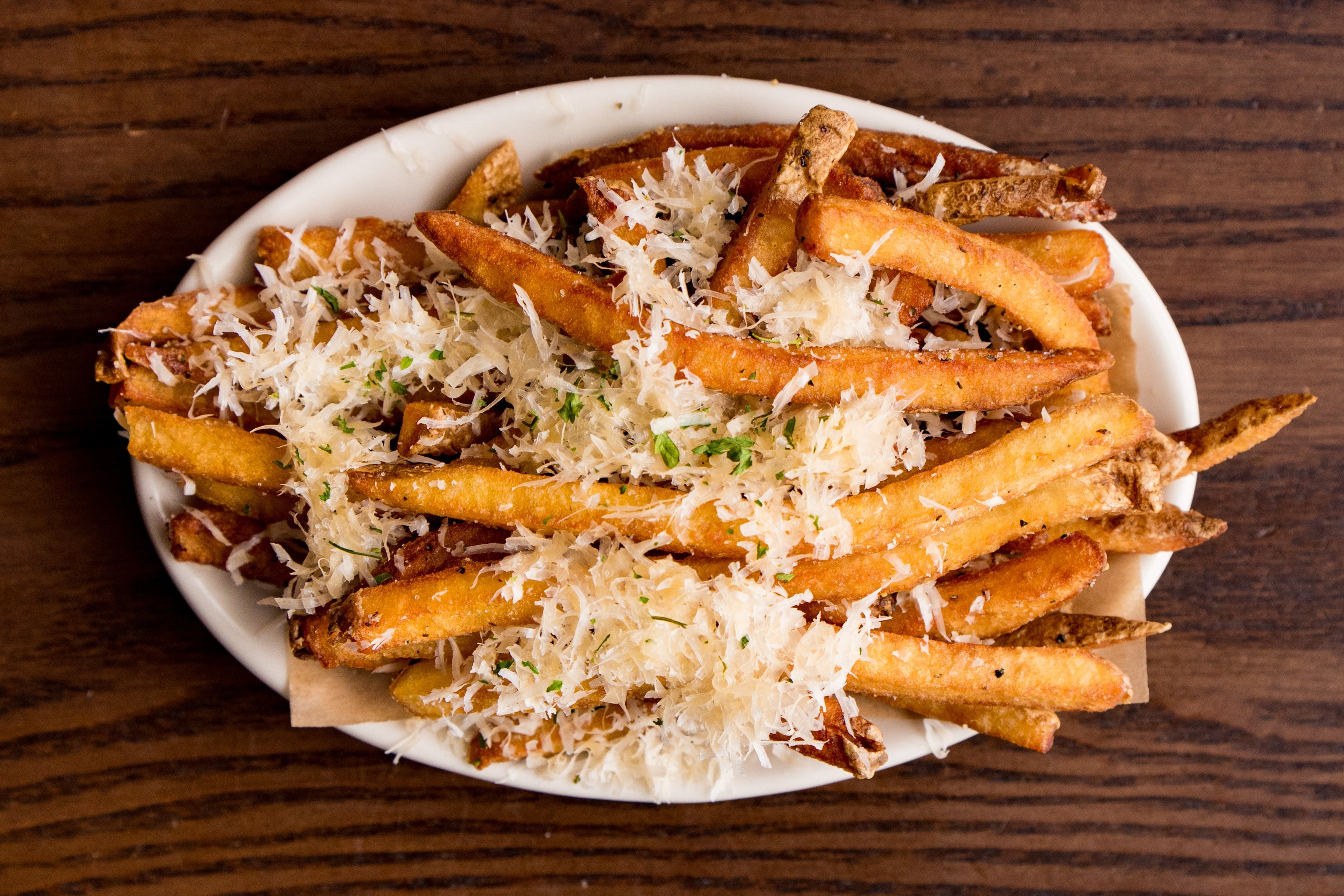 Order Parmesan Truffle Fries food online from DMK Burger Bar store, Chicago on bringmethat.com