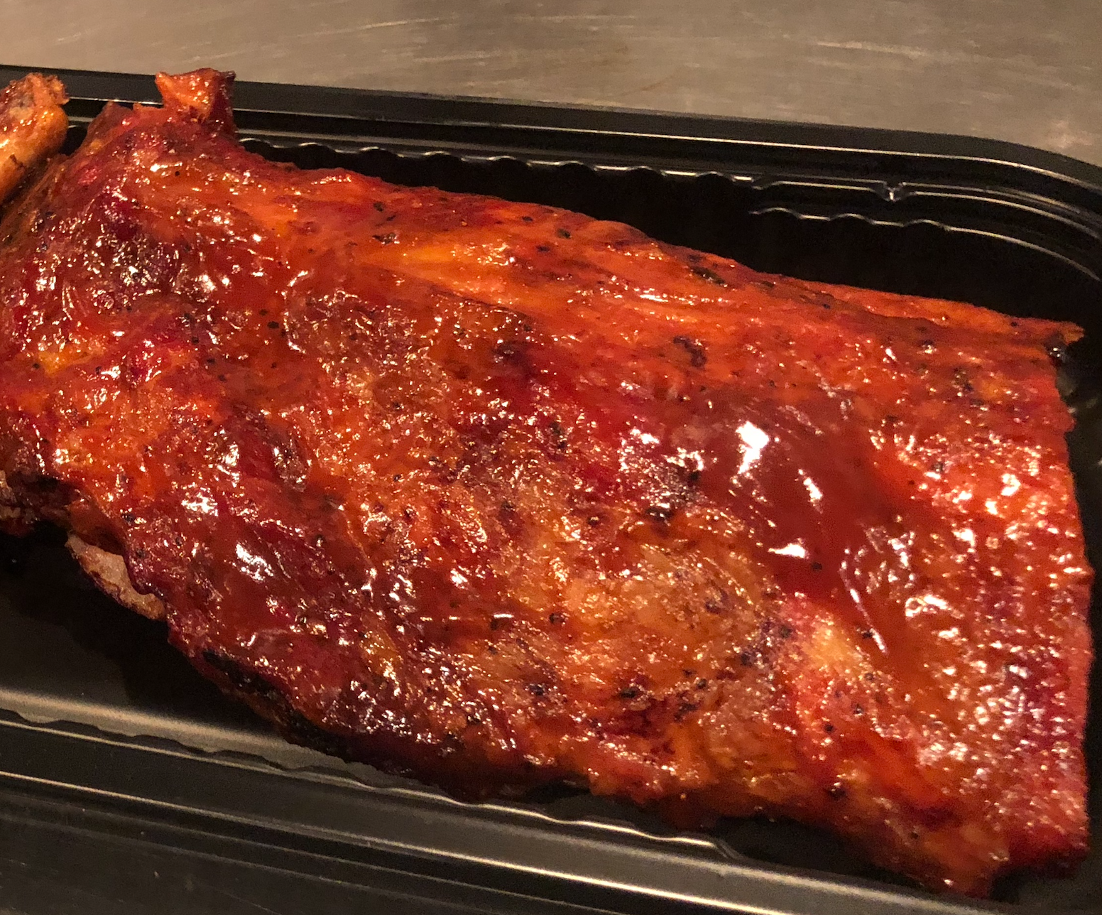 Order 1/2 Rack Of Ribs food online from Wildwood Smokehouse and Saloon store, Iowa City on bringmethat.com