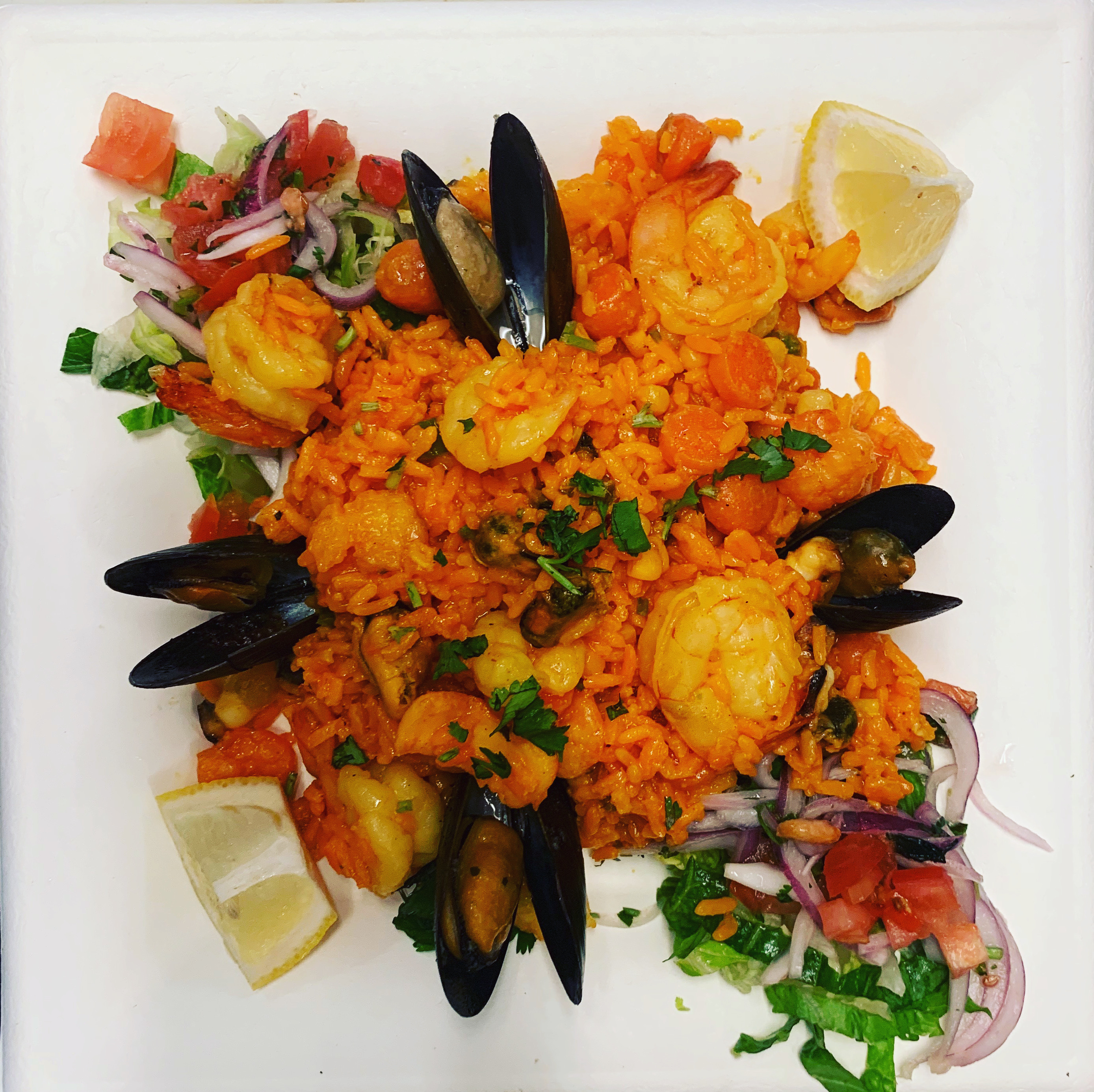 Order Seafood Paella Platter food online from The Roasting Oven store, Fort Mill on bringmethat.com