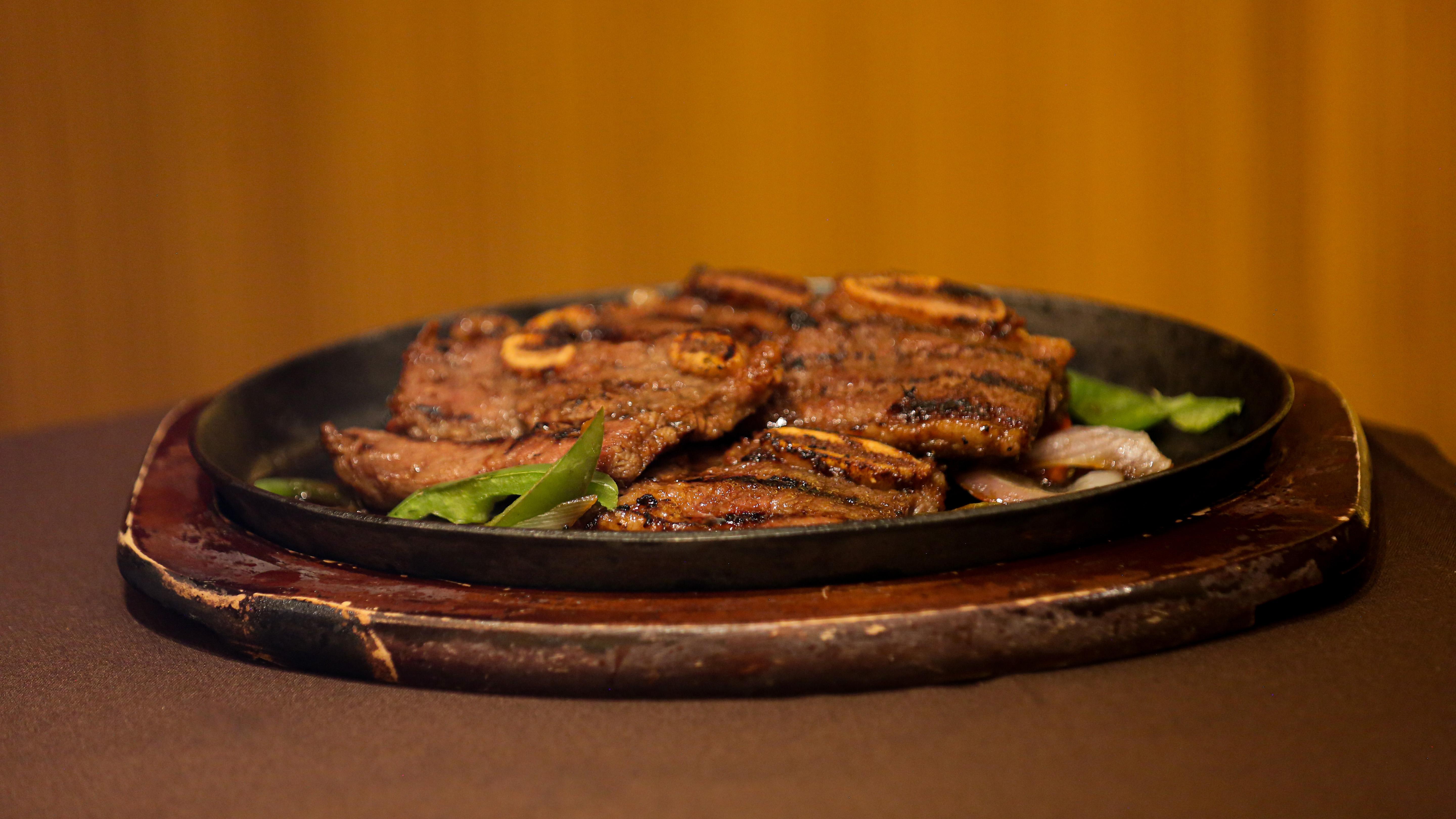 Order Beef Baby Short Ribs food online from MoCA Asian Bistro - Queens store, Forest Hills on bringmethat.com