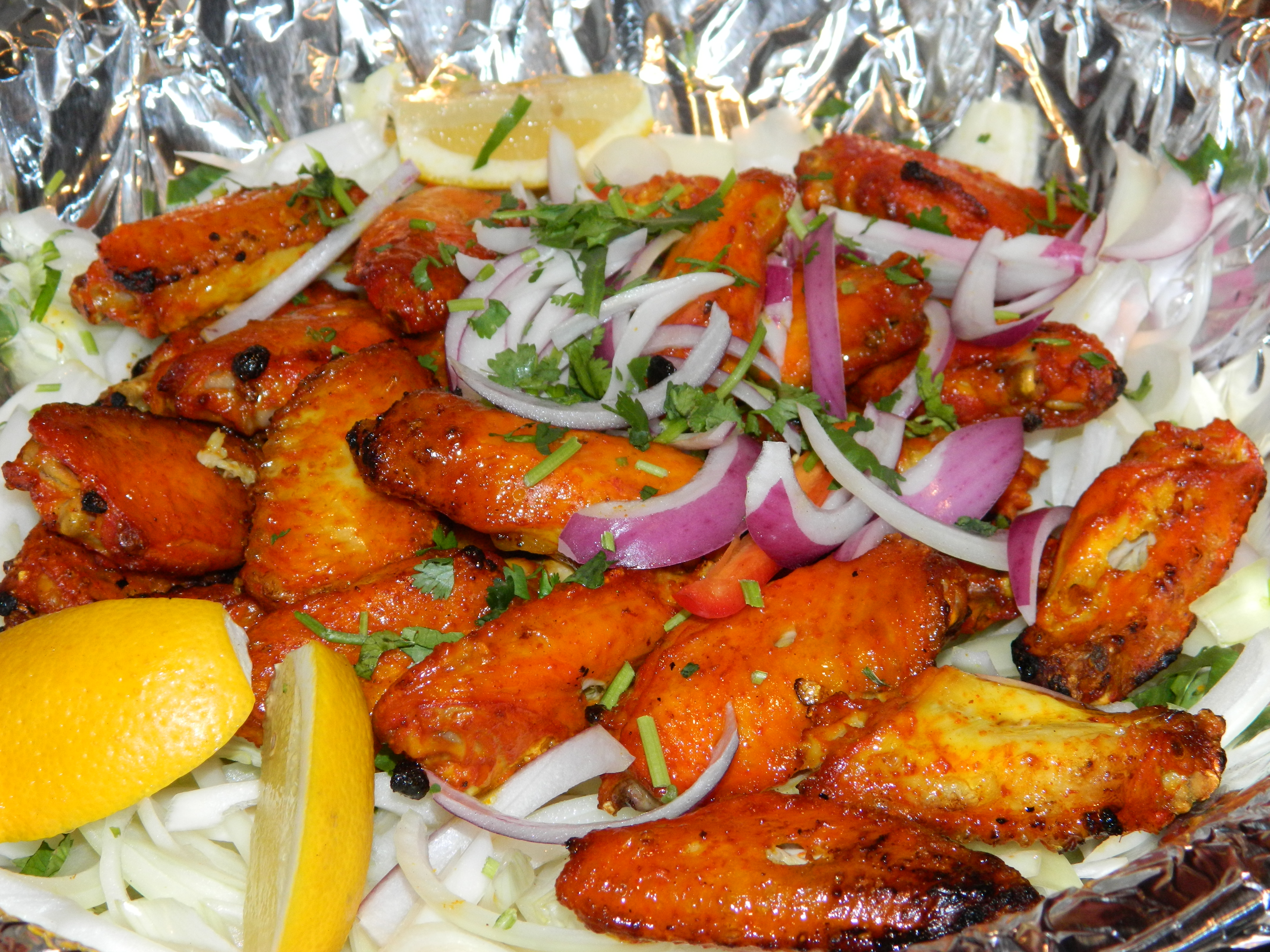 Order Tandoori Wings food online from Ambadi store, White Plains on bringmethat.com