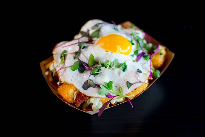Order Crisp Tots & Local Egg food online from Velvet Taco store, San Antonio on bringmethat.com