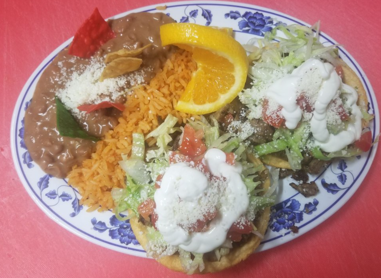 Order 2 Sopes with Choice of Meat Combo Plate food online from Tori Nick Taqueria store, Santa Ana on bringmethat.com