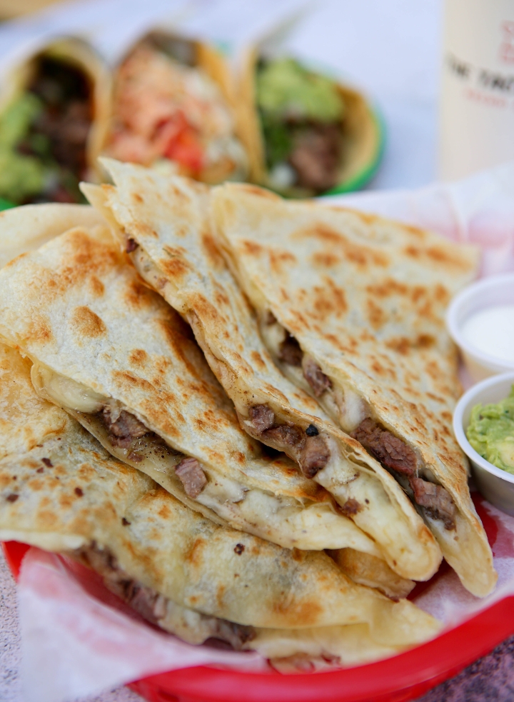 Order CARNE ASADA QUESADILLA food online from The Taco Stand store, San Diego on bringmethat.com