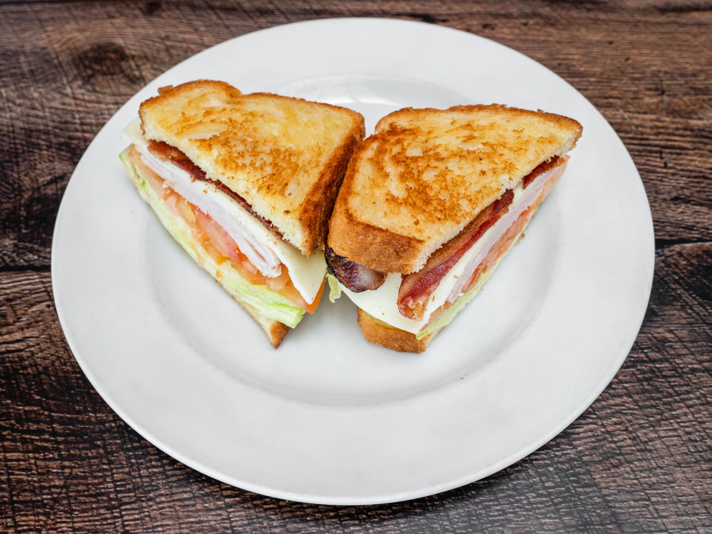 Order Turkey Club  food online from Crepes & Burgers store, Citrus Heights on bringmethat.com